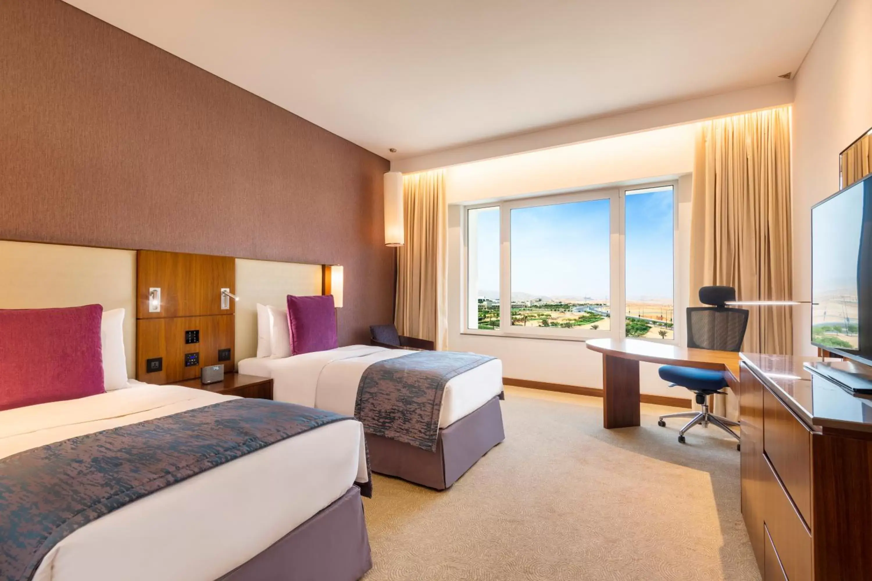 Bed in Crowne Plaza Muscat OCEC, an IHG Hotel