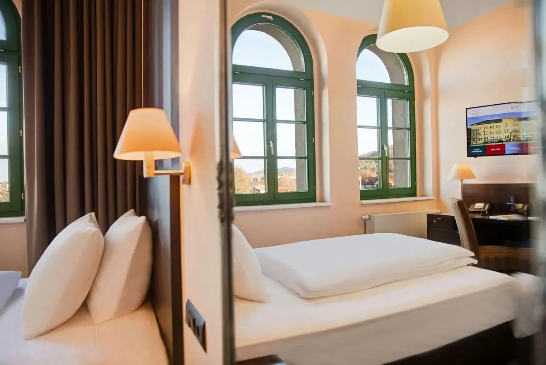 Photo of the whole room, Bed in GreenLine Schlosshotel Blankenburg