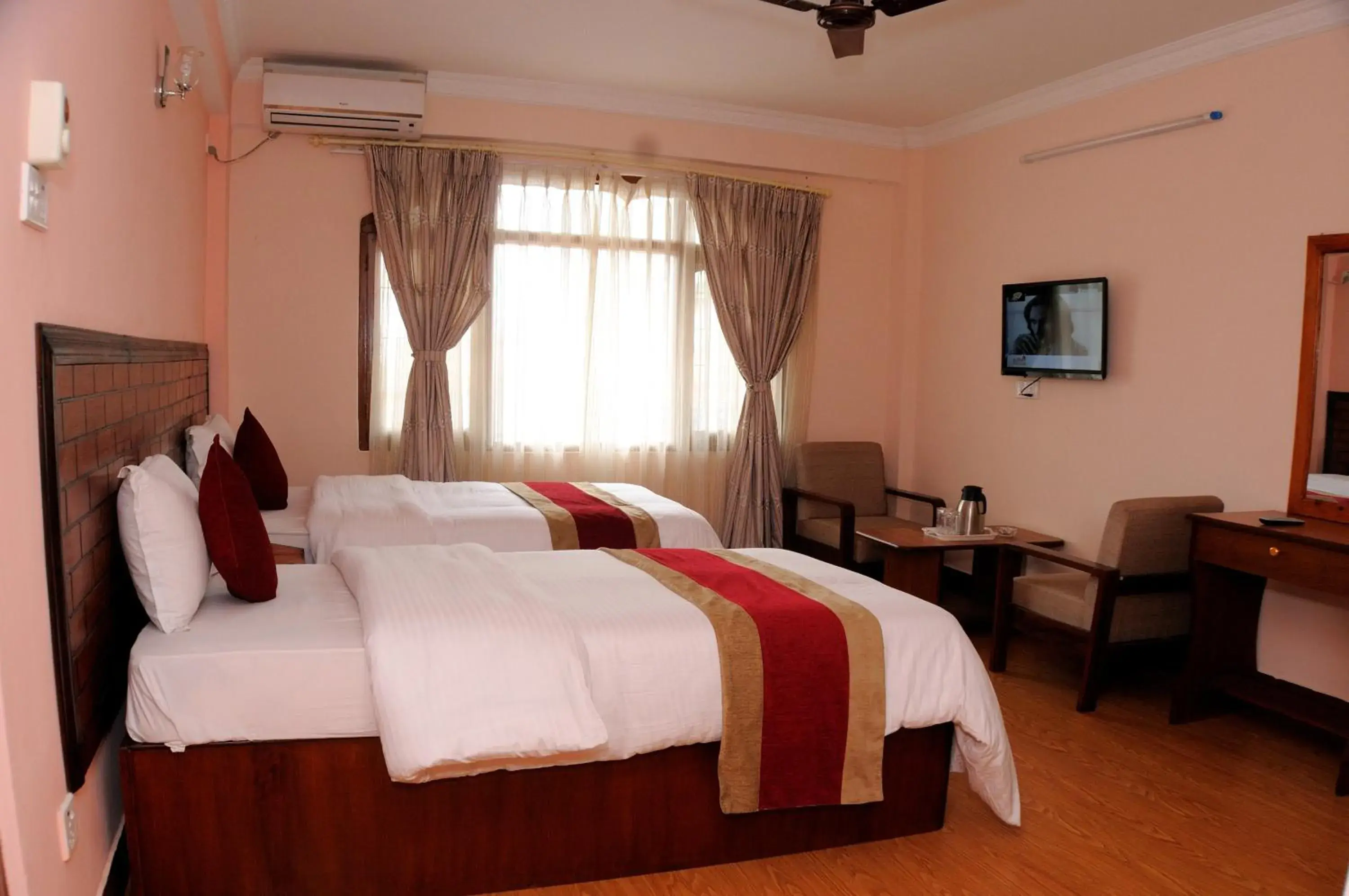 Photo of the whole room, Bed in Hotel Brihaspati