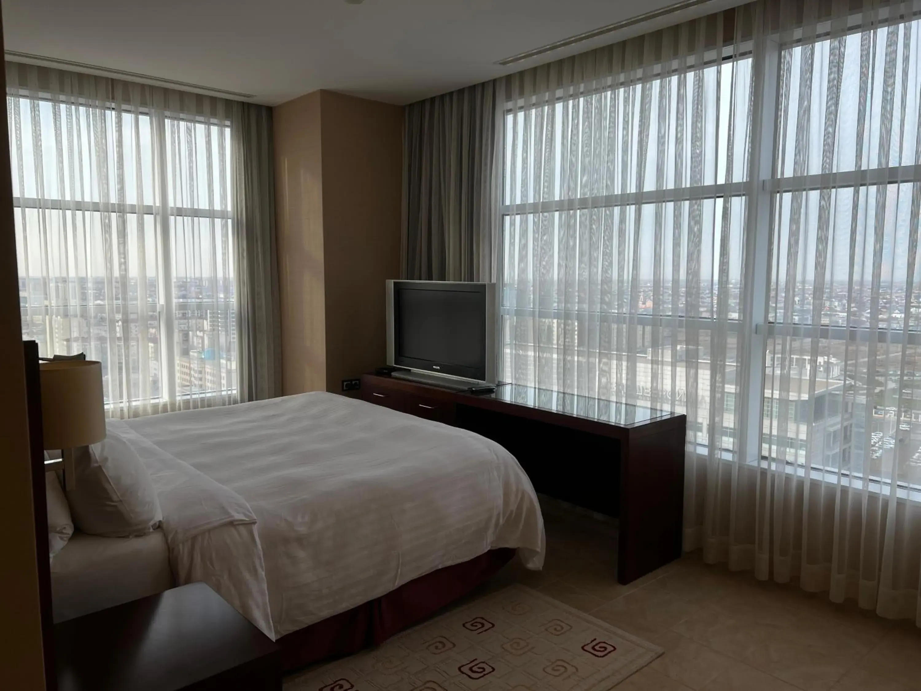 Property building, Bed in Marriott Executive Apartments Atyrau