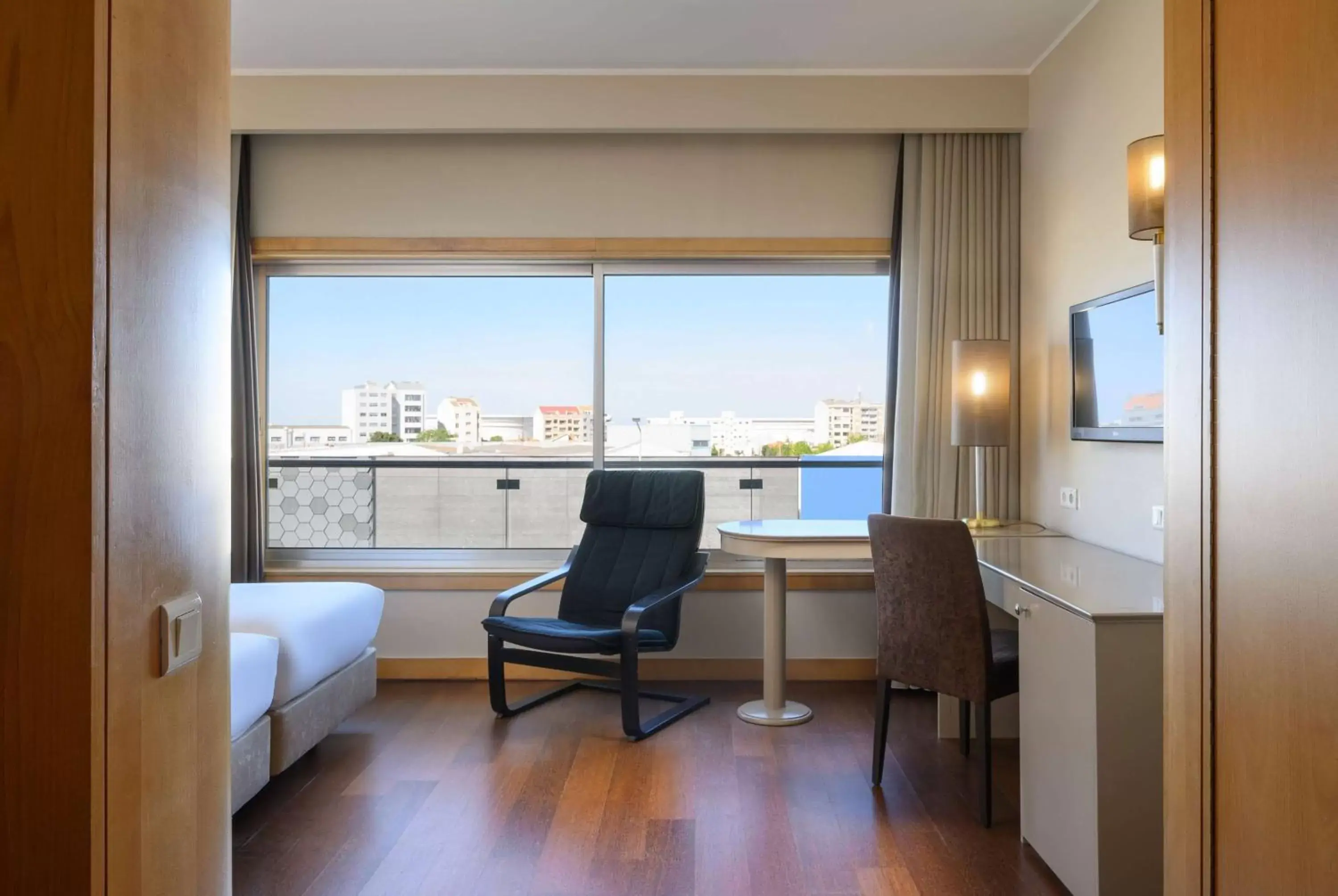 Photo of the whole room in TRYP by Wyndham Porto Expo Hotel