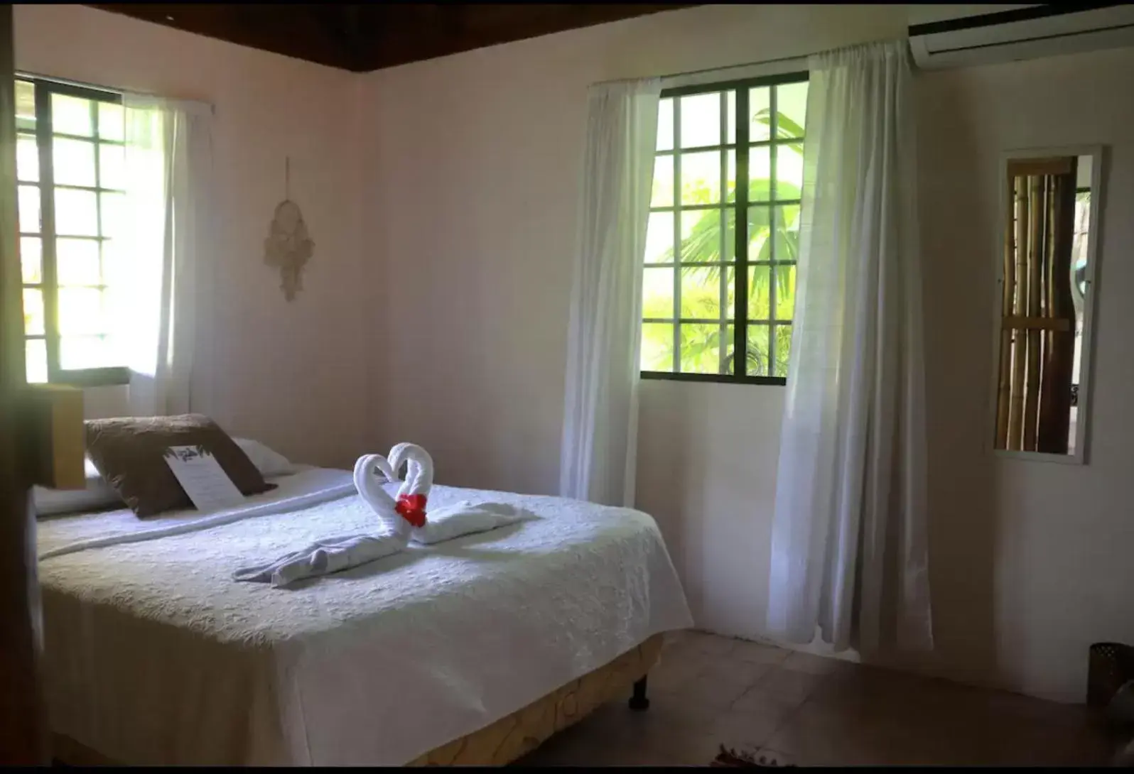 Bed in Casa G - Manuel Antonio oceanview hotel