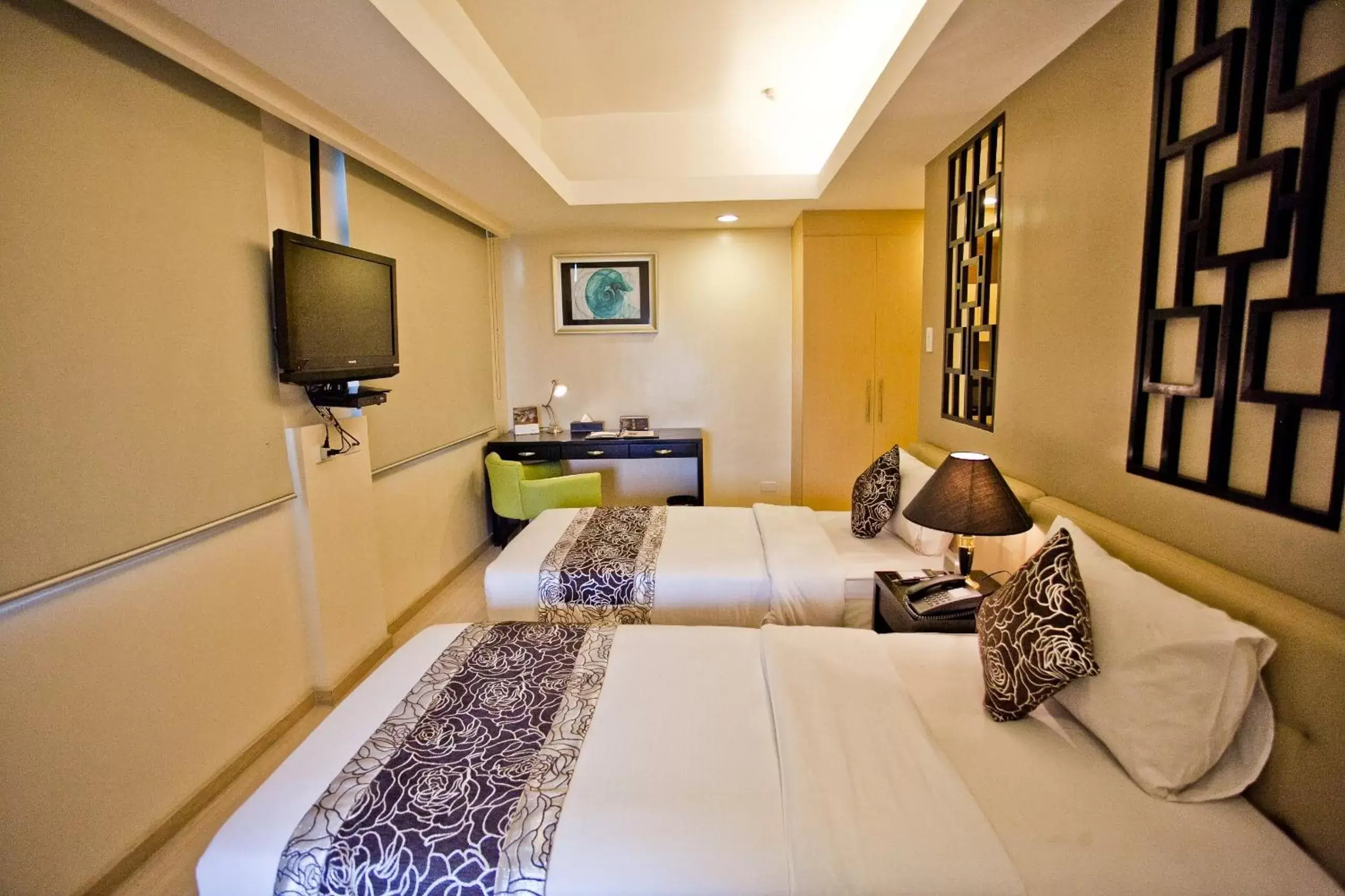 Bed in The Exchange Regency Residence Hotel Managed by HII