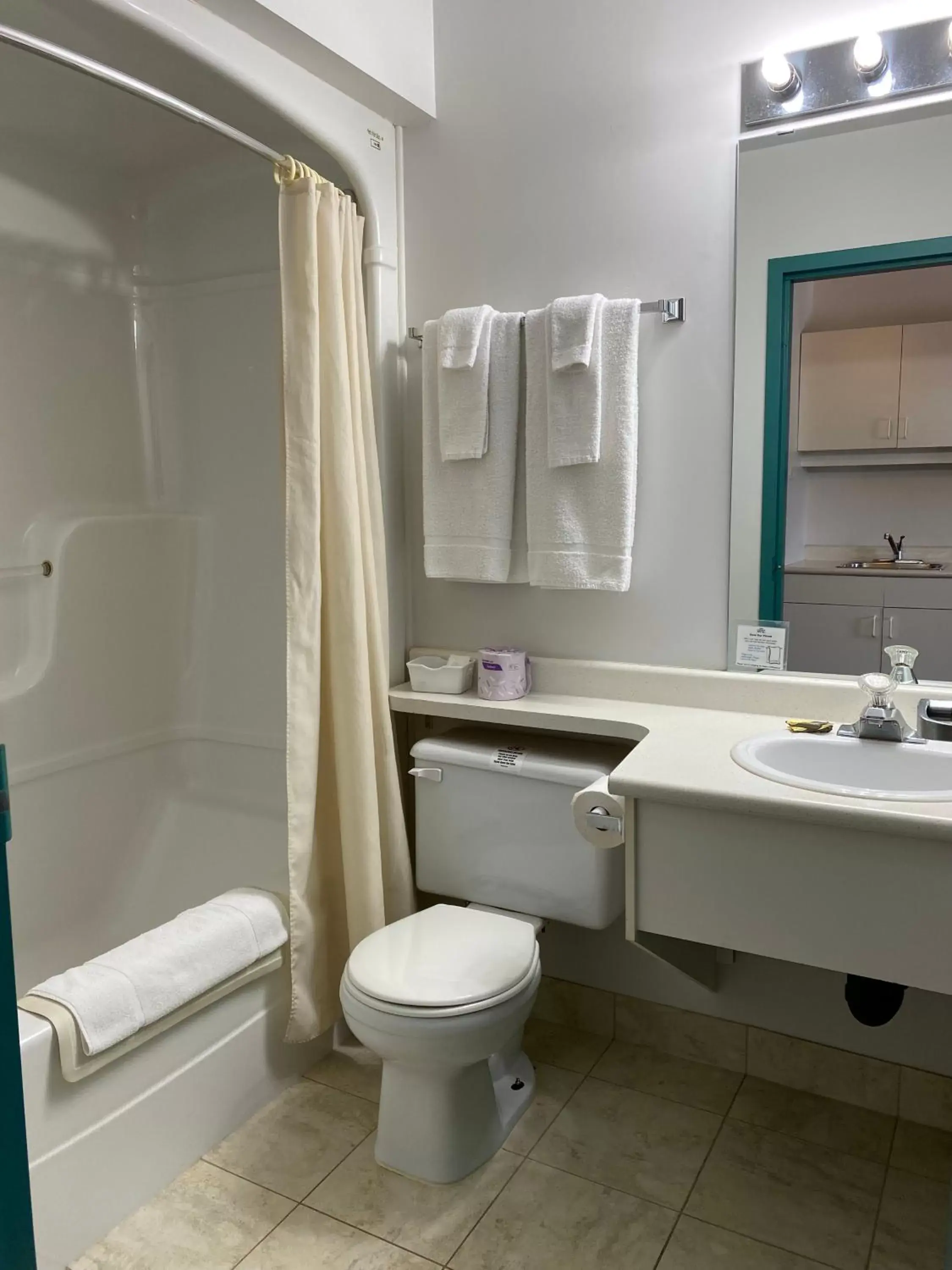 Shower, Bathroom in Sleep Suite Motel