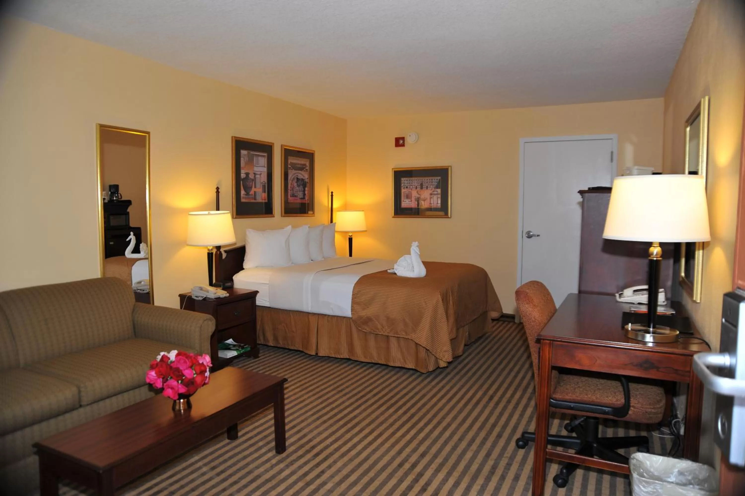 Bed in Opal Hotel & Suites