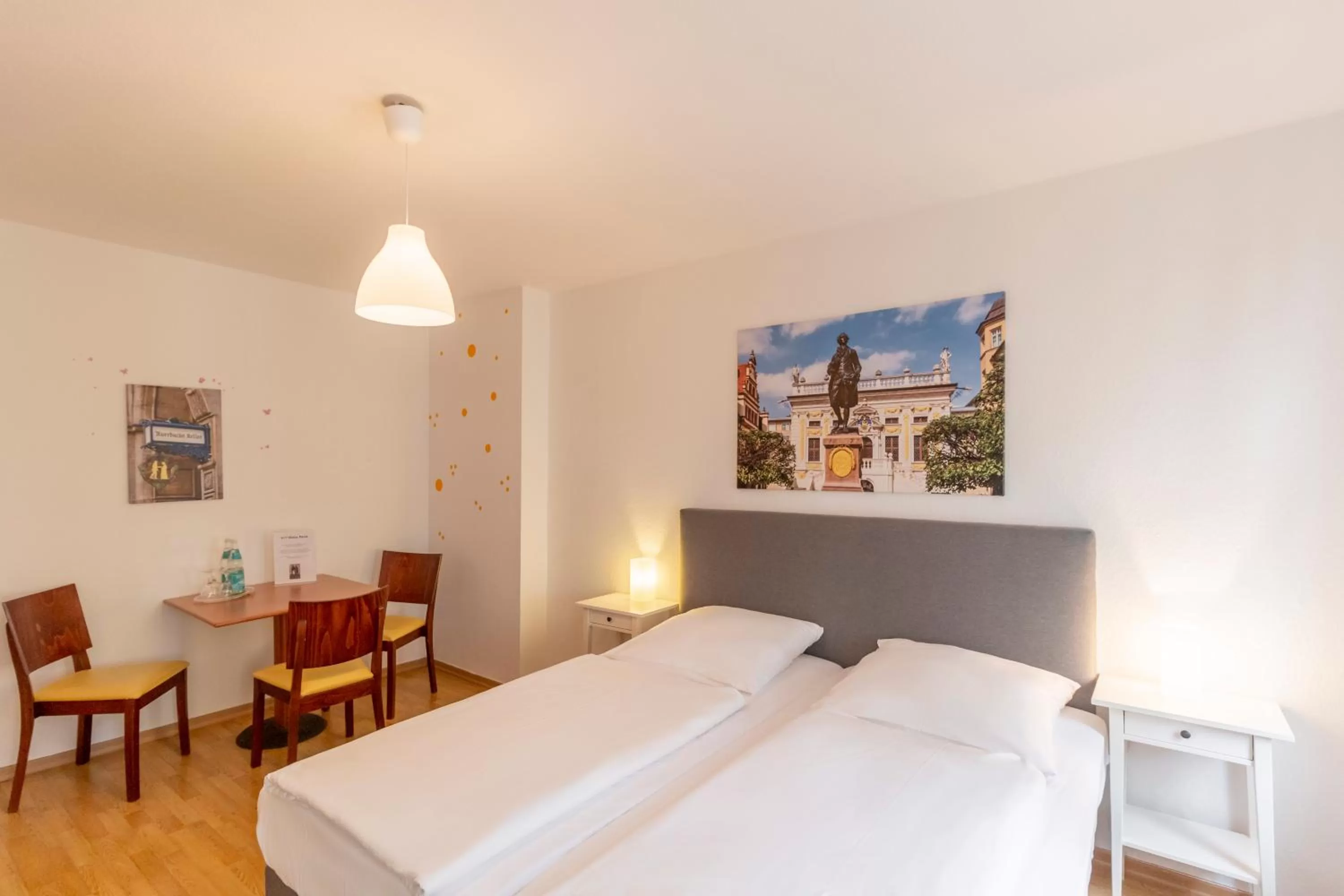 Seating area, Bed in Hotel Markgraf Leipzig