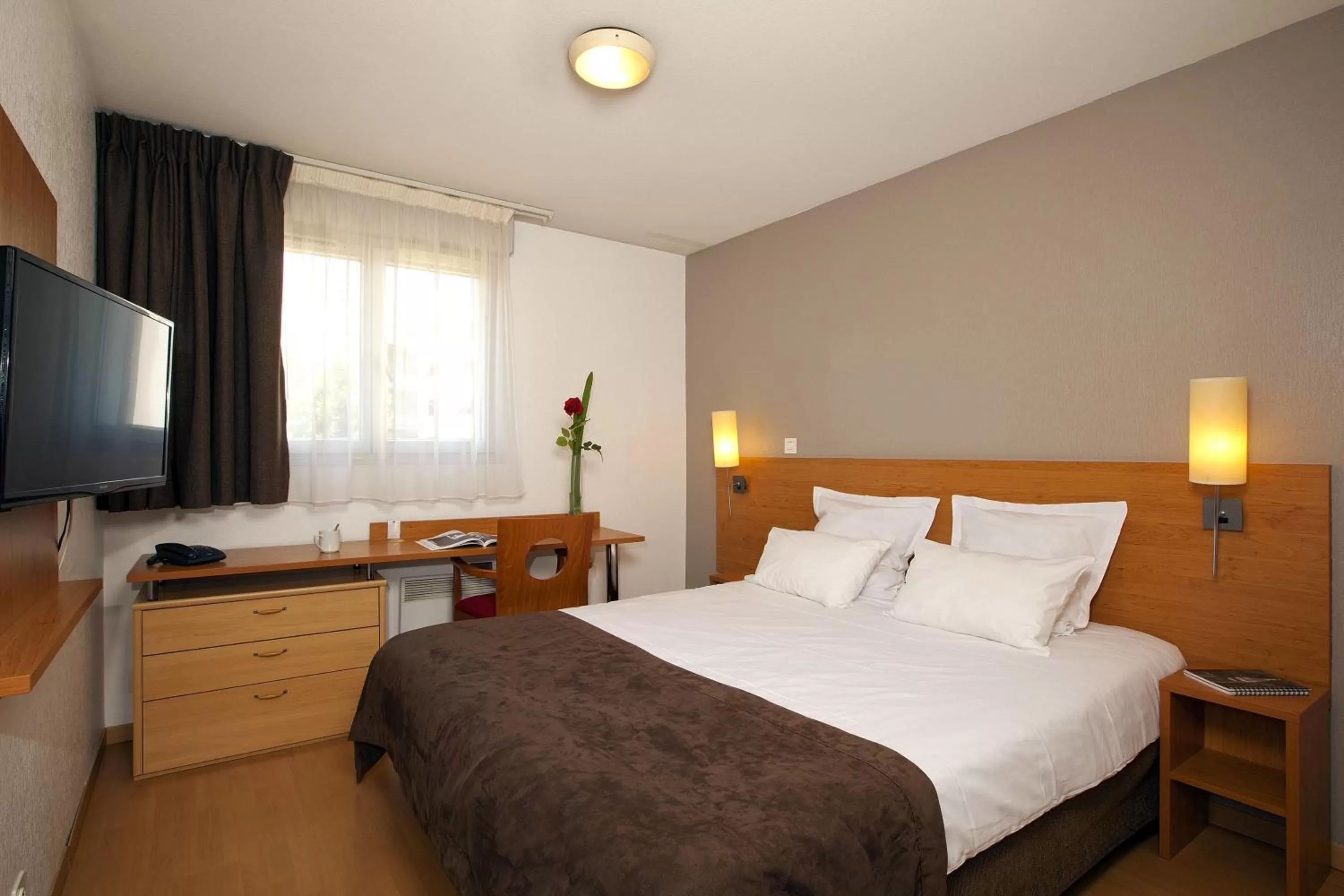 Bedroom, Bed in Séjours & Affaires Nantes Ducs De Bretagne