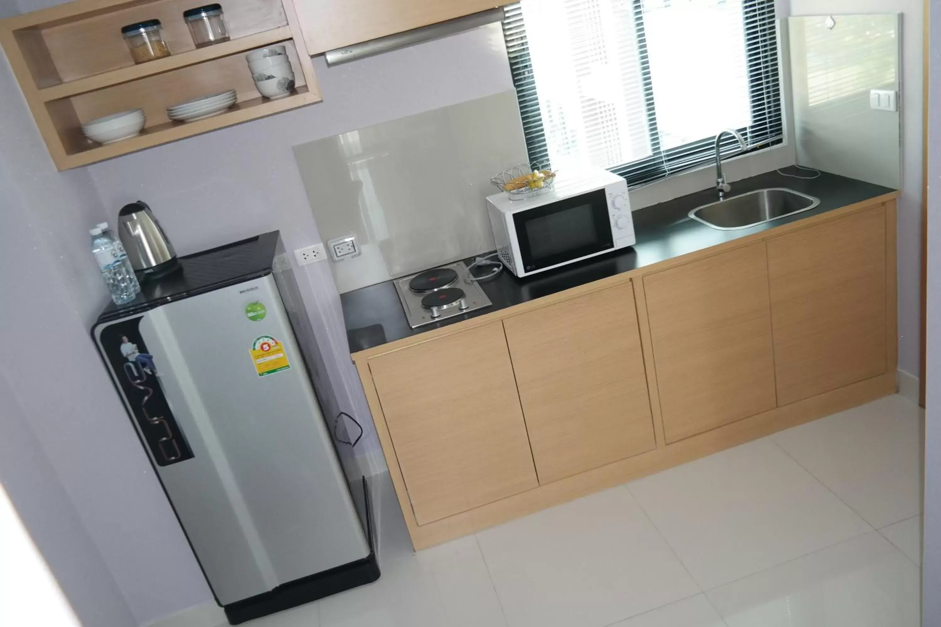 Kitchen/Kitchenette in Diana Garden Resort - SHA Extra Plus