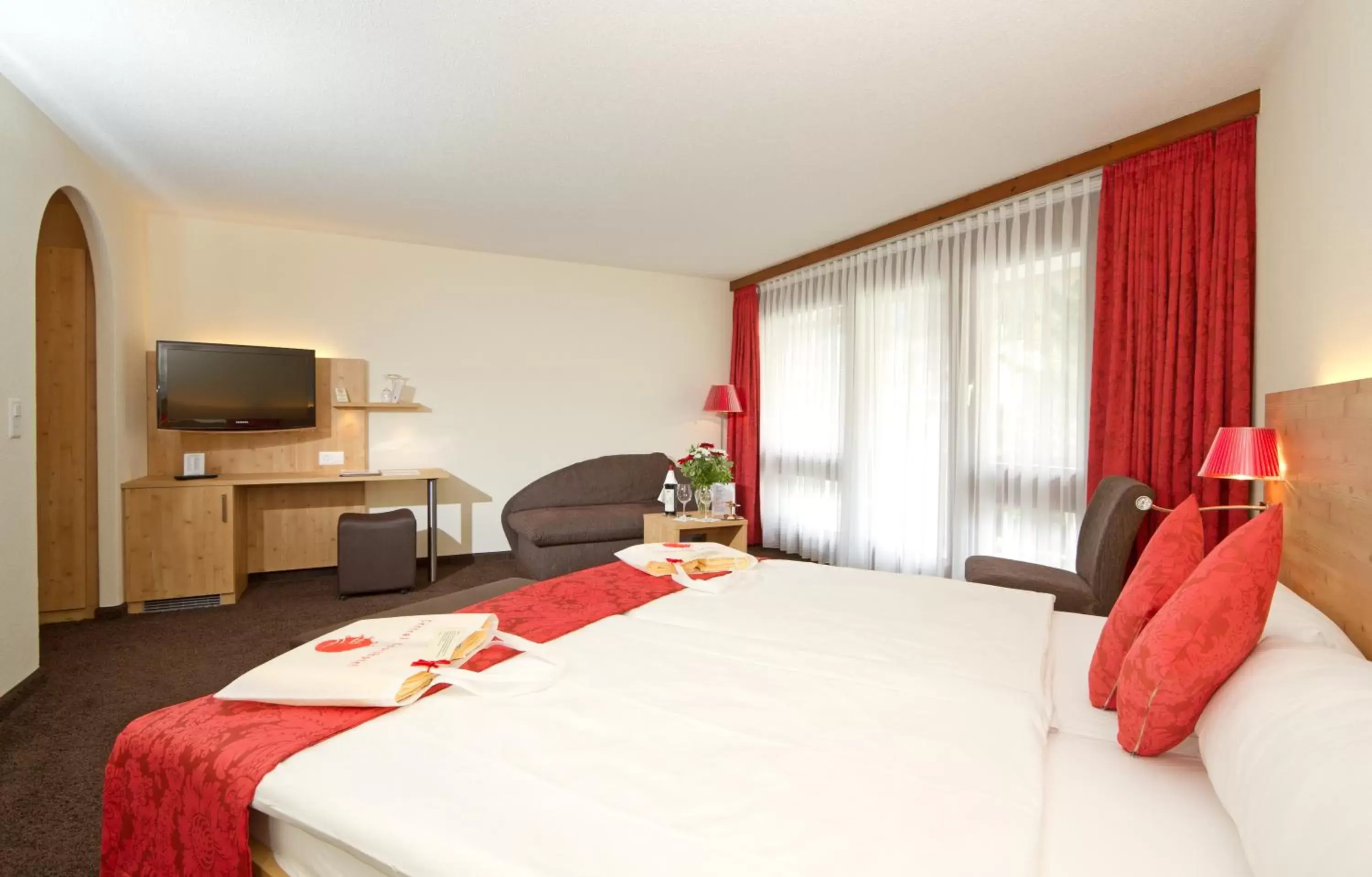 Photo of the whole room, Bed in Central Swiss Quality Sporthotel