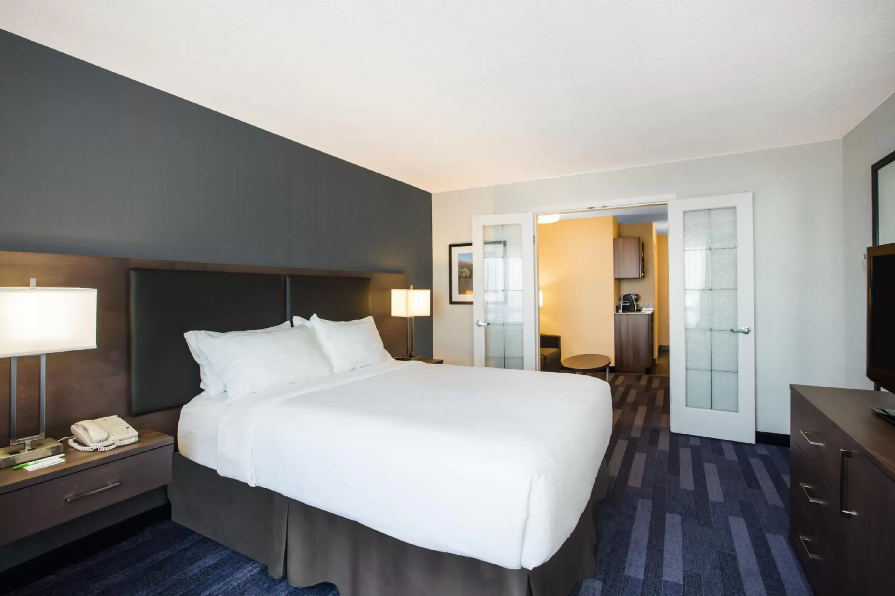 Bed in Holiday Inn & Suites Grande Prairie, an IHG Hotel