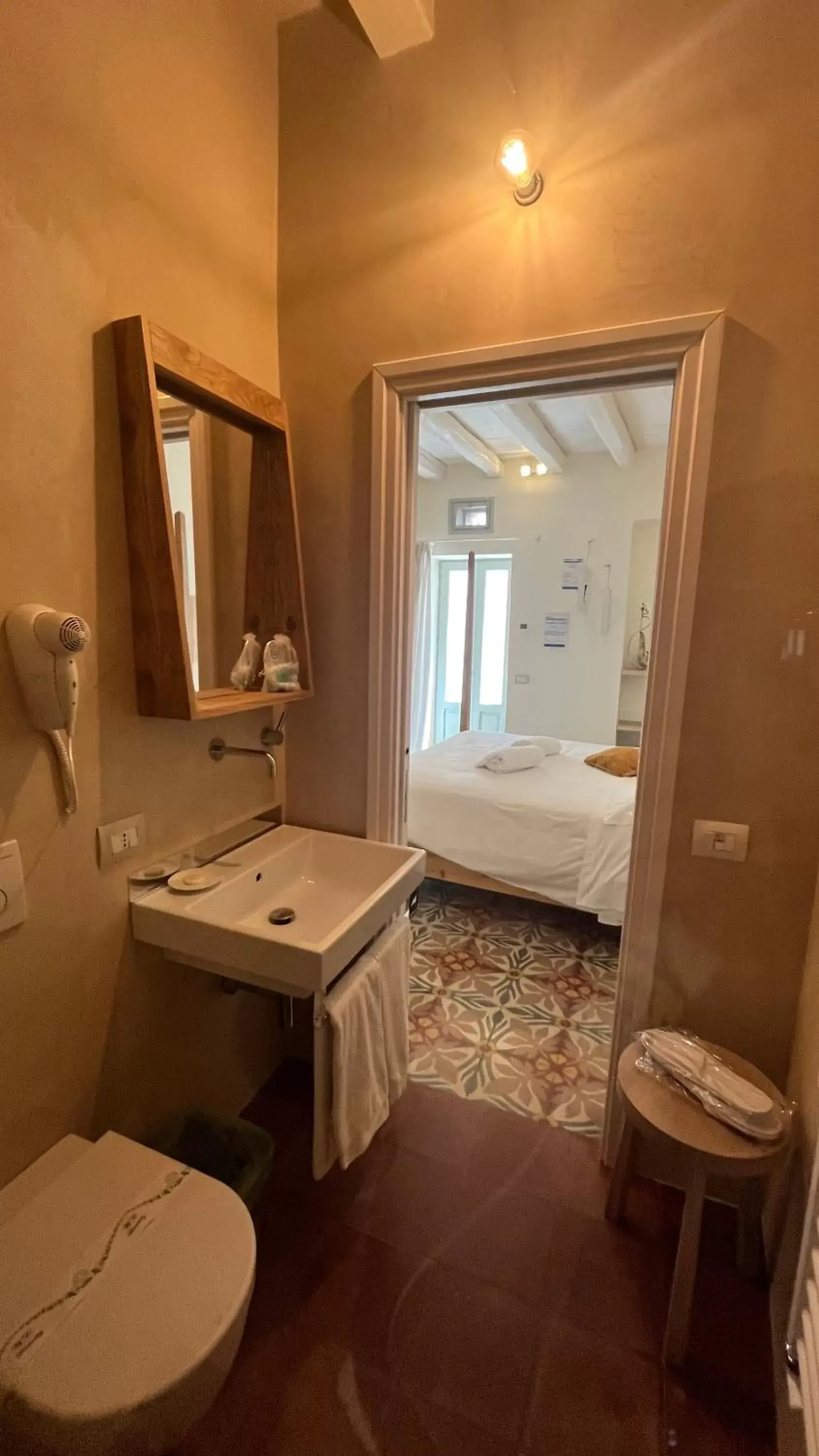 Bathroom in Antico Mondo Rooms & Suites