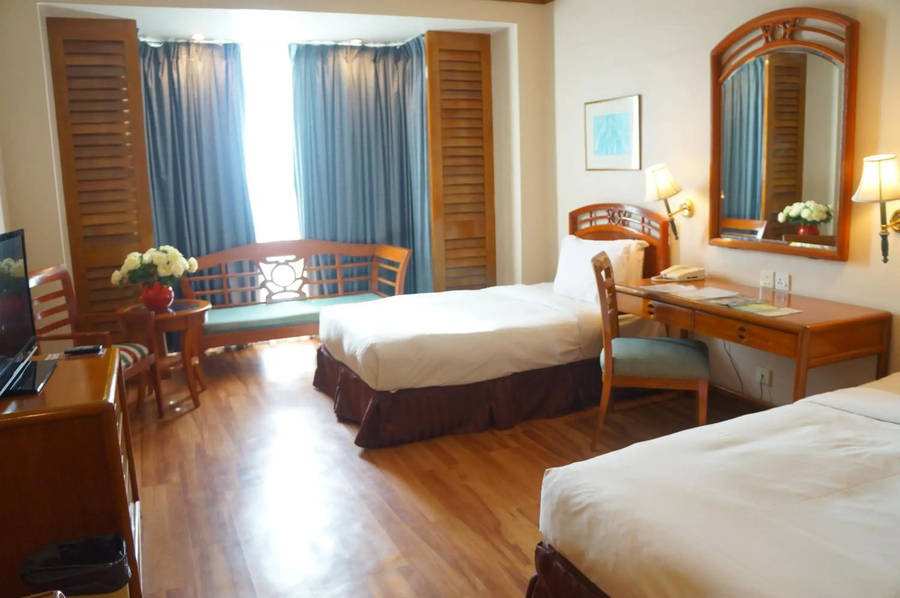 Seating area, Bed in Sabah Oriental Hotel