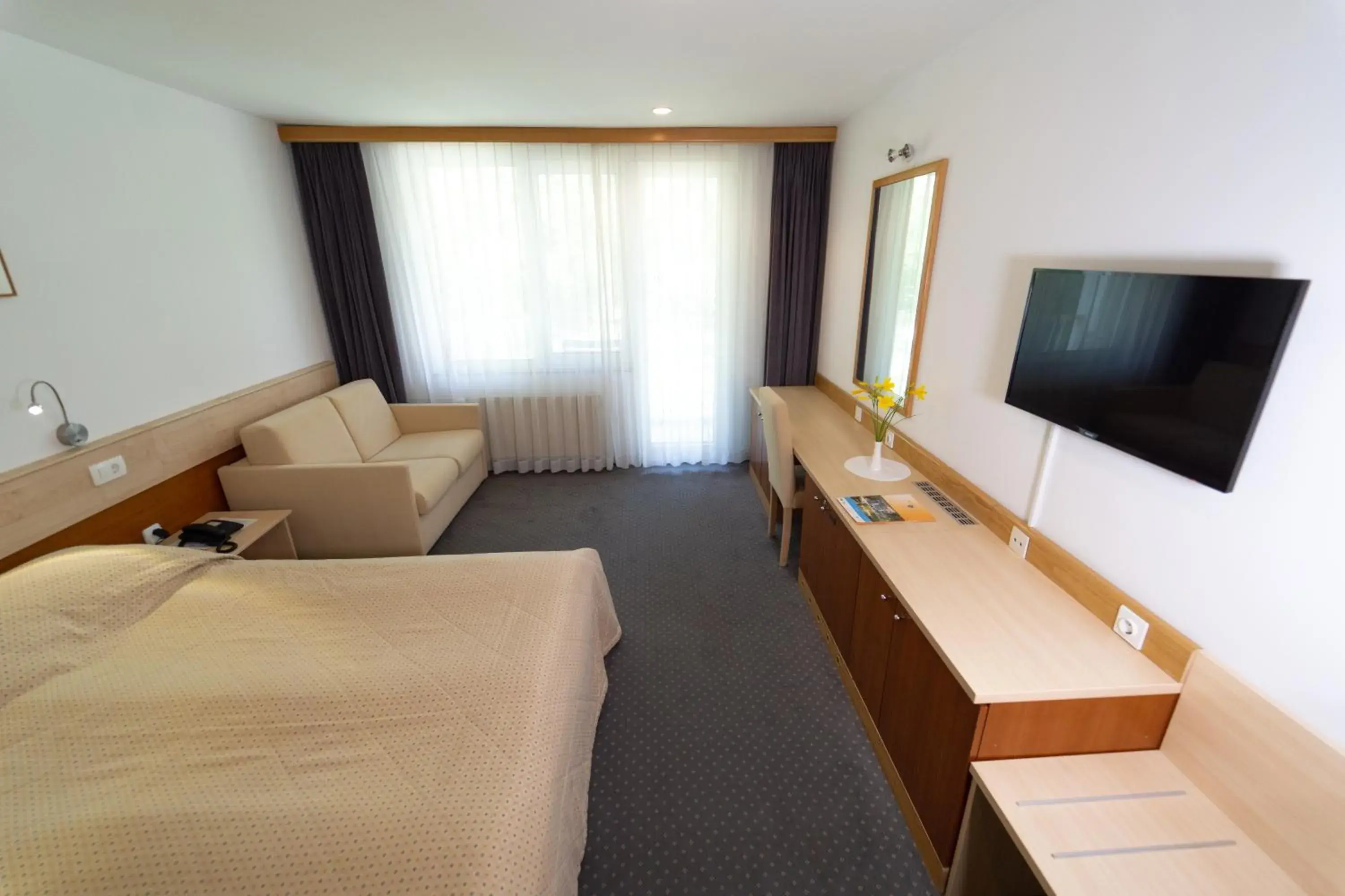 Photo of the whole room, TV/Entertainment Center in Hotel Jezero