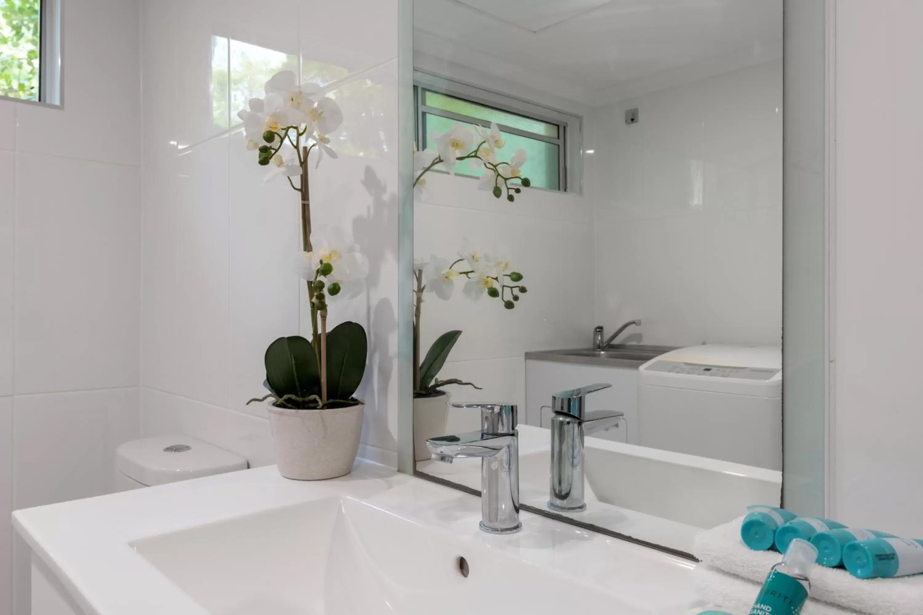 Bathroom in Lychee Tree Holiday Apartments