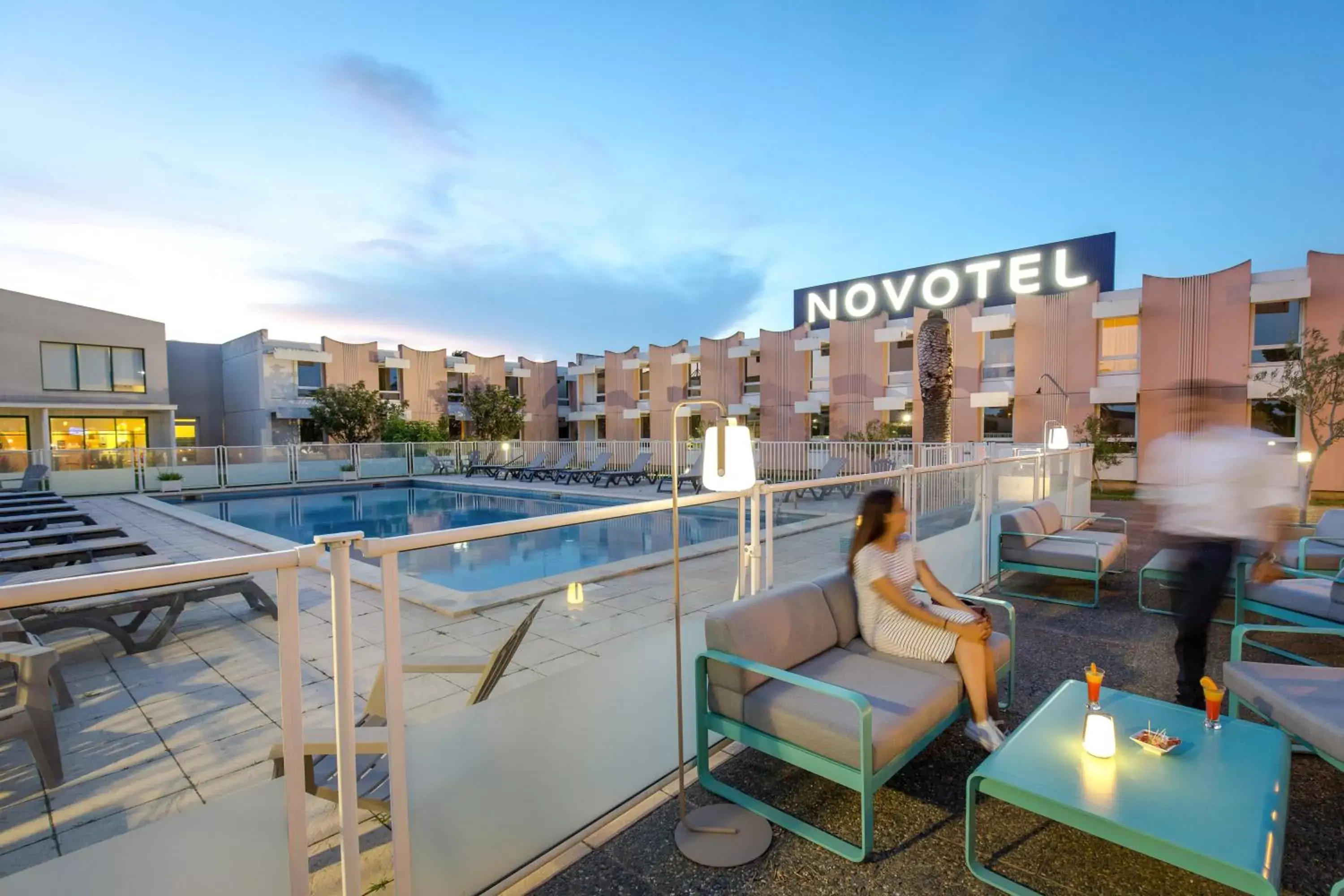 Patio, Swimming Pool in Novotel Perpignan Nord Rivesaltes