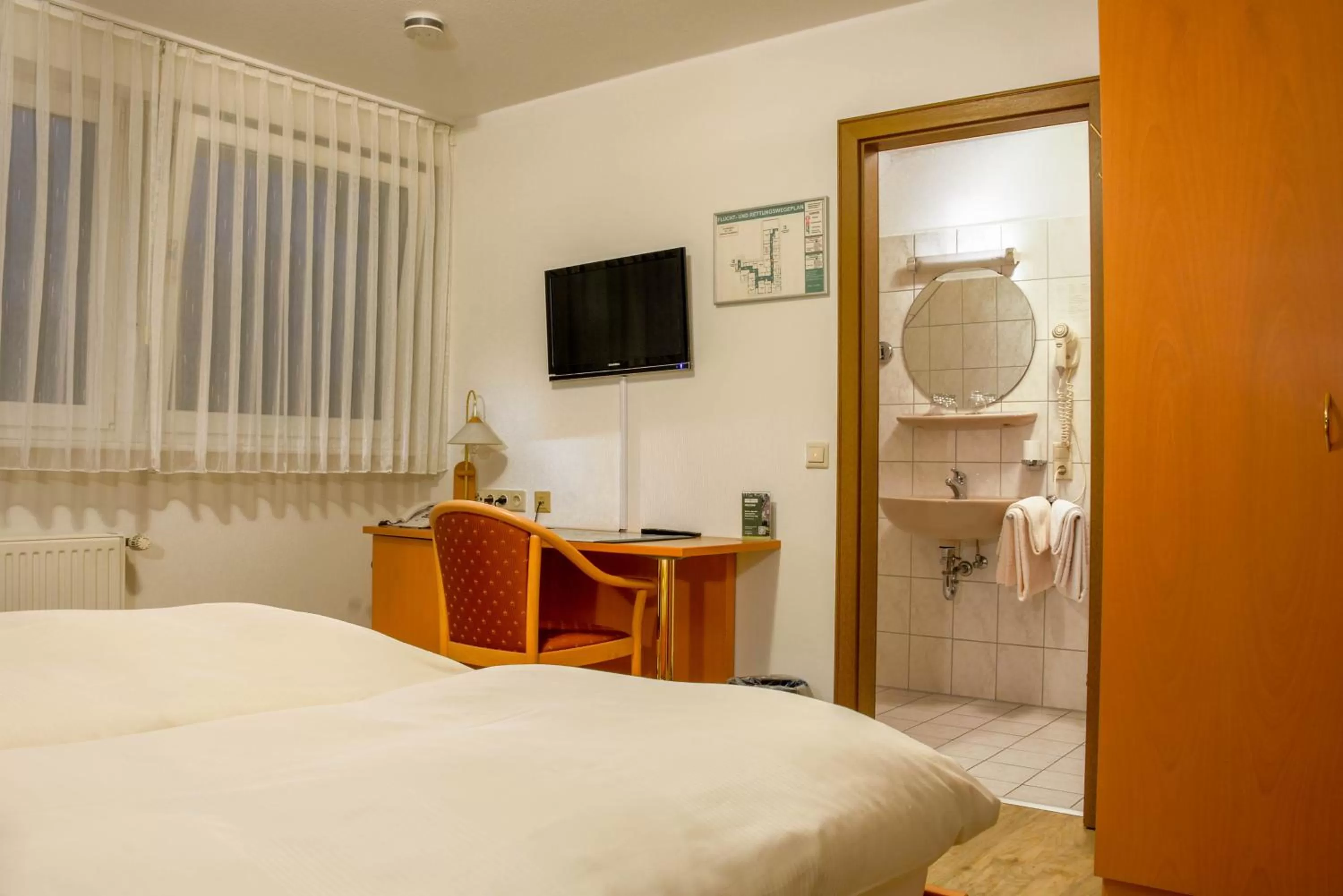 Photo of the whole room, Bed in Gasthof Waldesruh