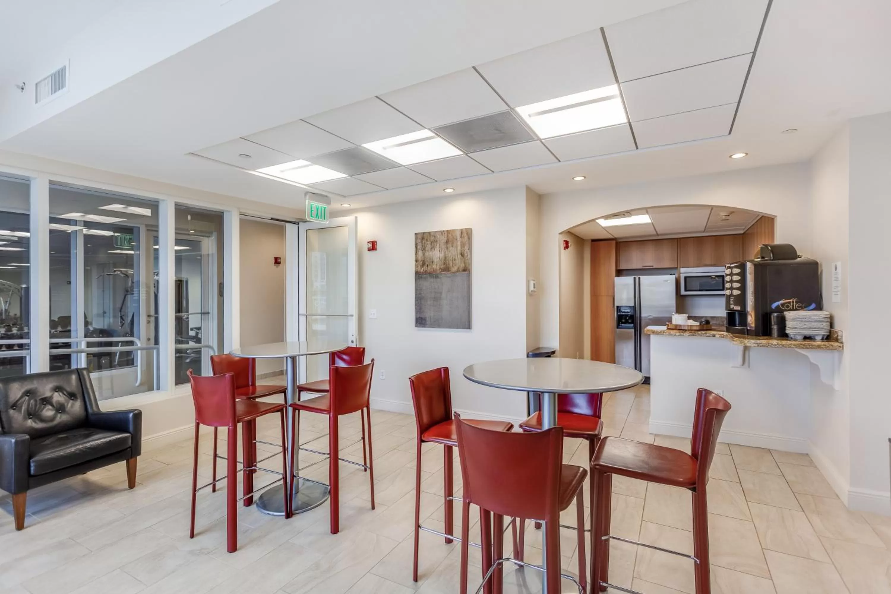 Communal lounge/ TV room in Dadeland Towers by Miami Vacations