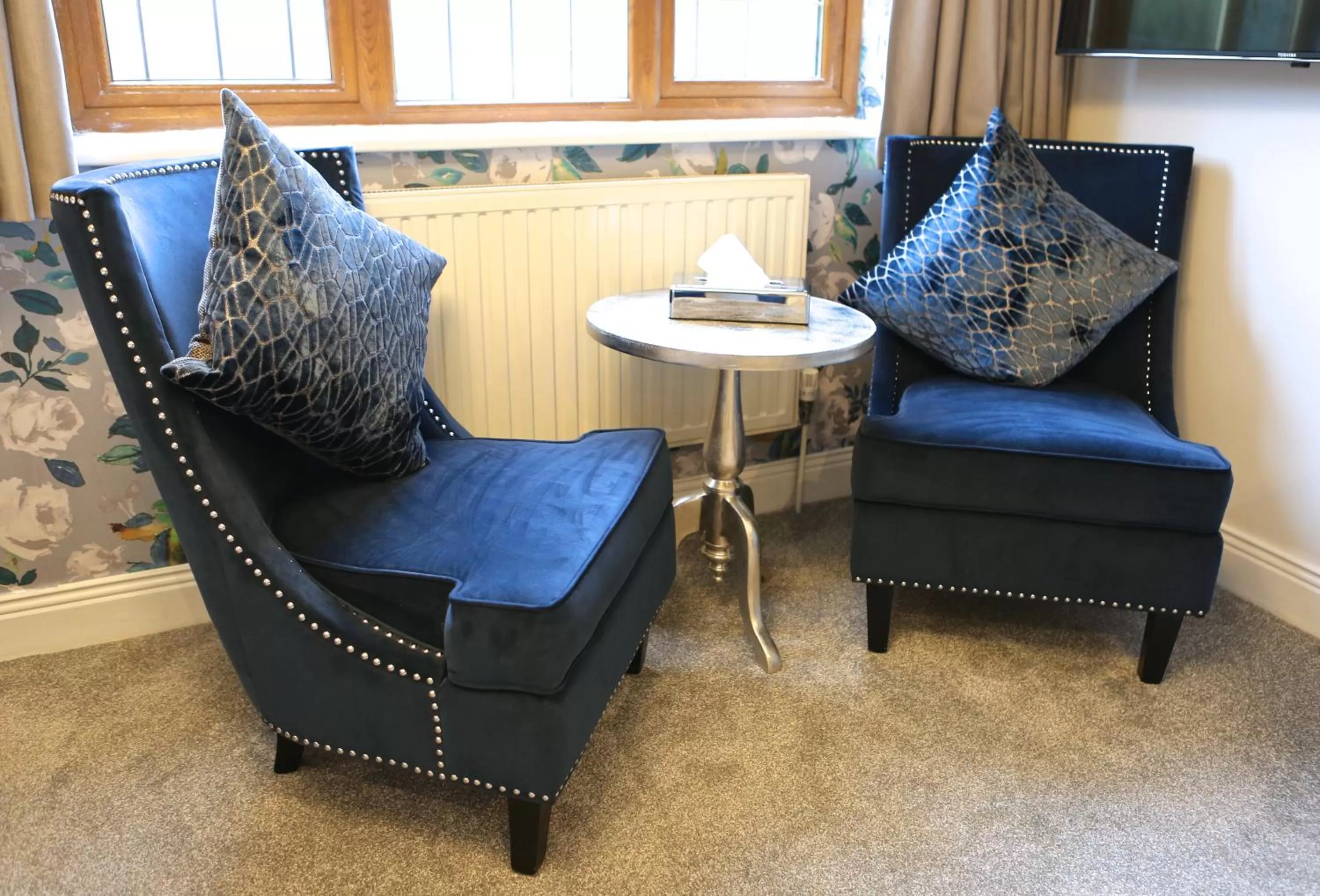 Seating area in De Rougemont Manor