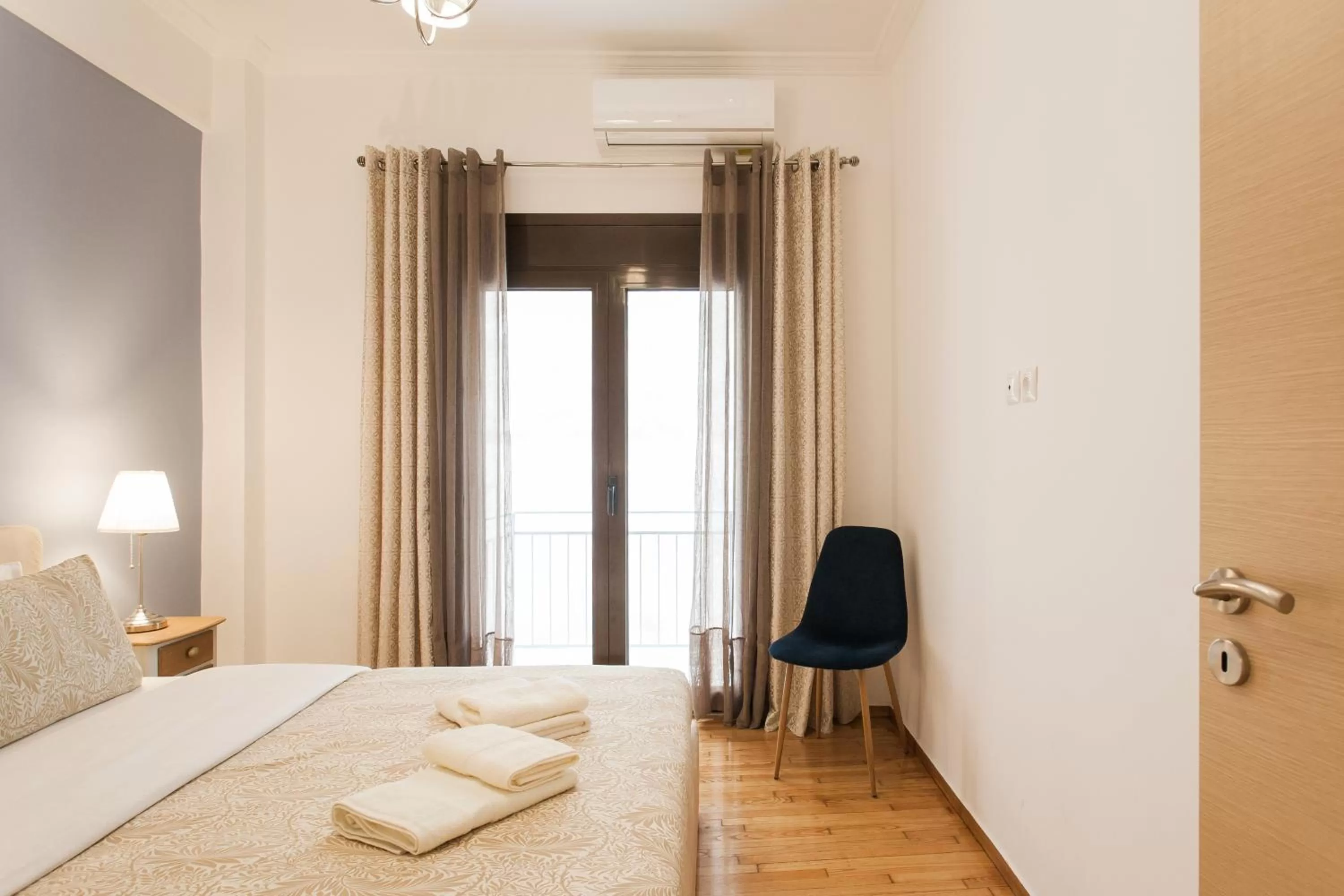 Bedroom, Bed in Nicholas Point Apartments and Rooms