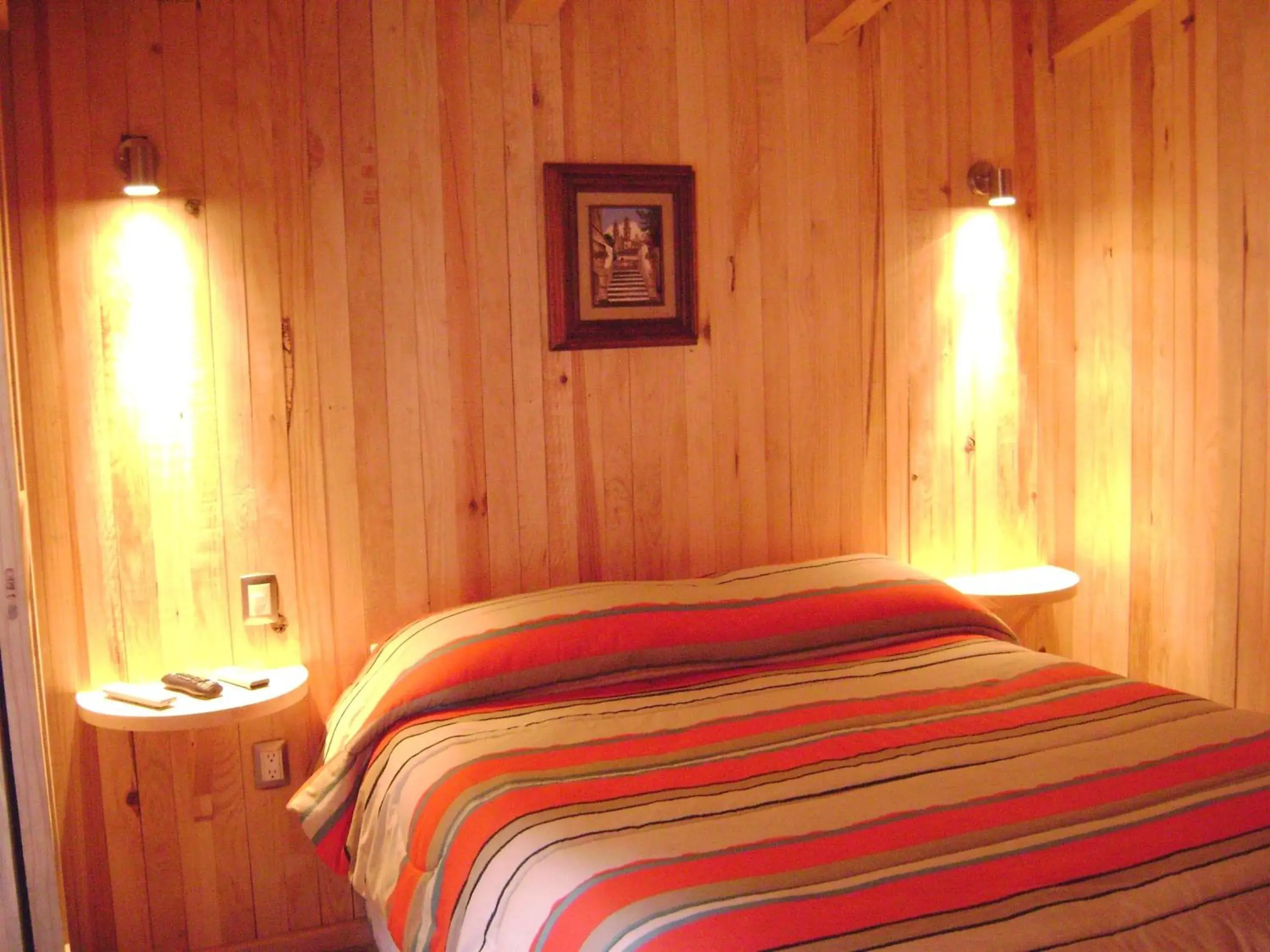 Bedroom, Bed in Cabañas El Estribo Hotel