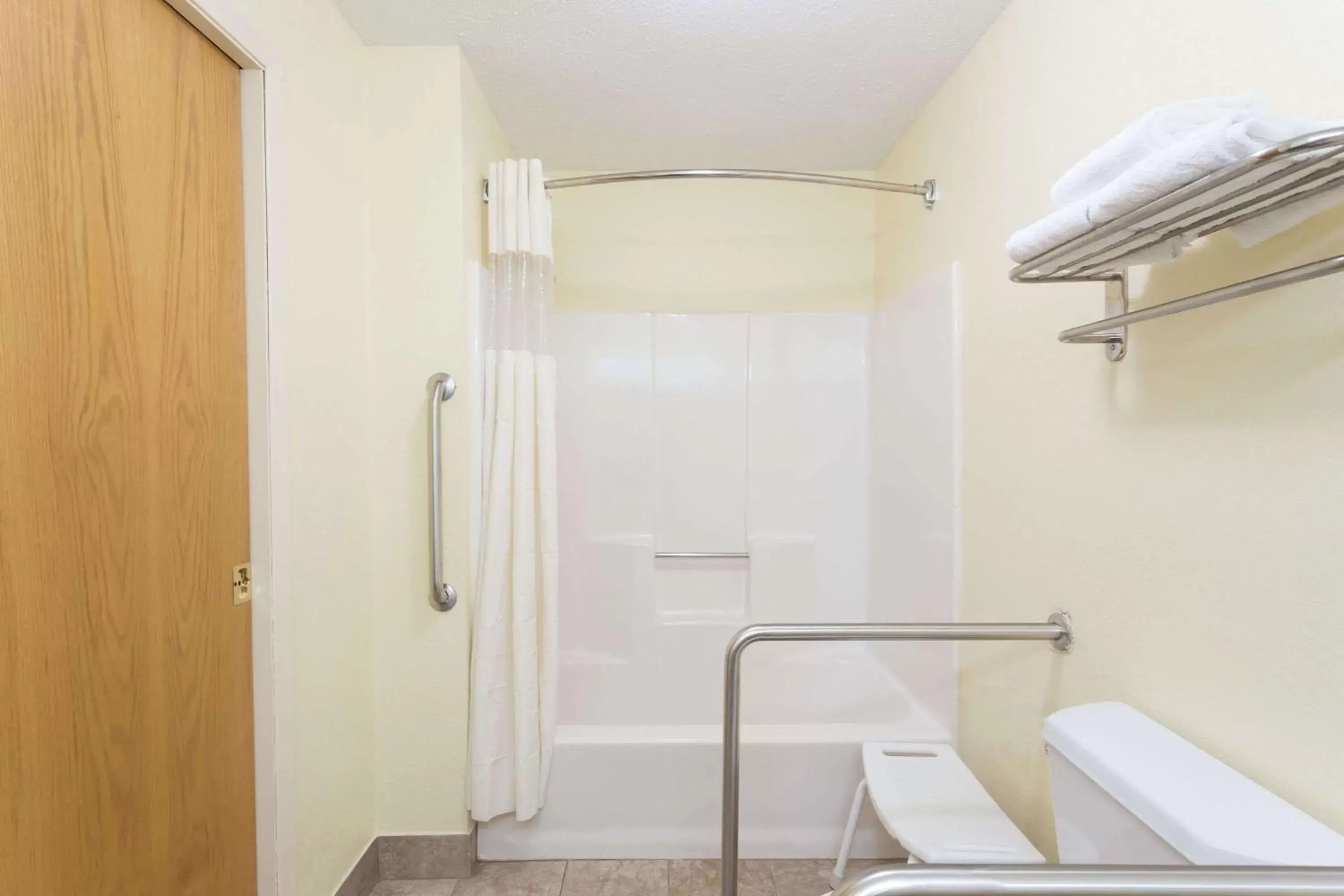 Bathroom in Days Inn & Suites by Wyndham Bloomington/Normal IL