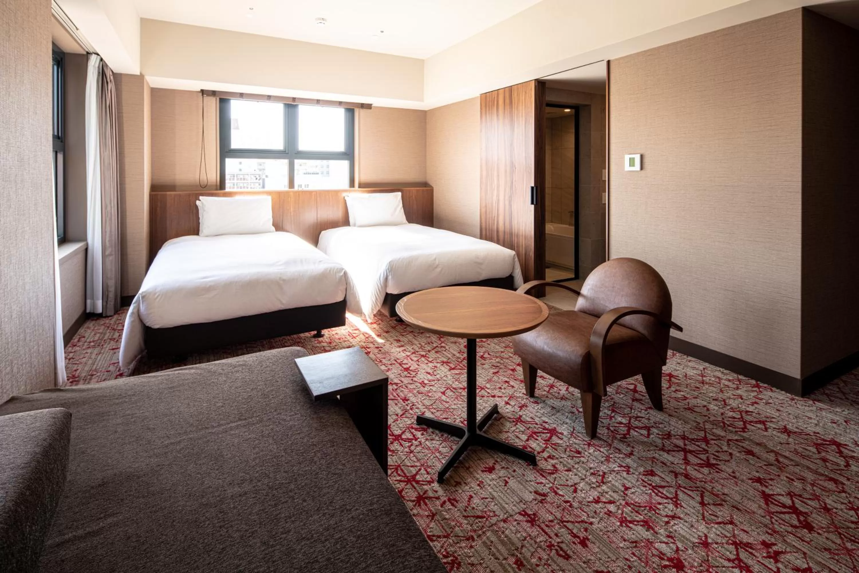 Bed in THE BASICS FUKUOKA