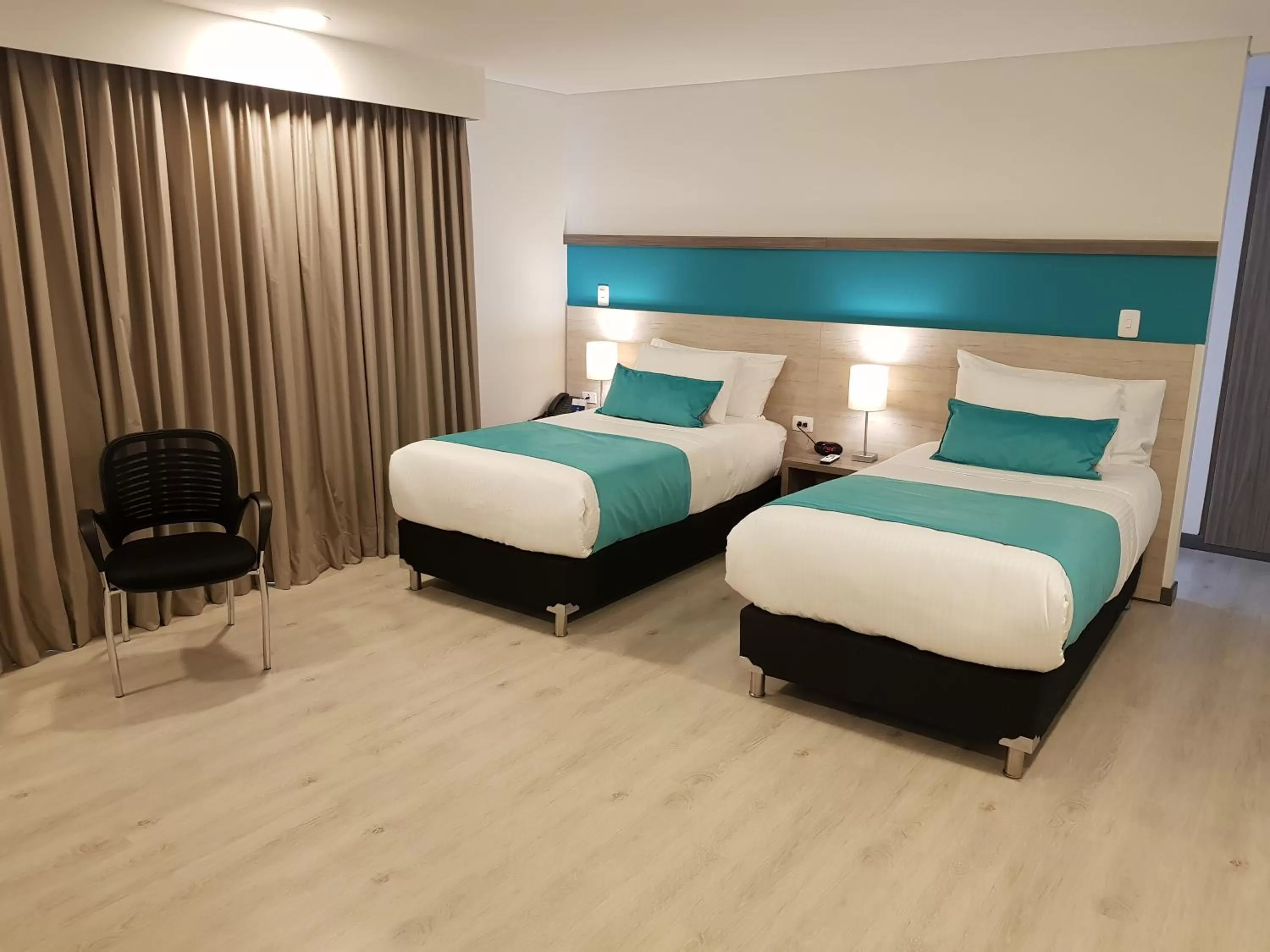 Bed in Hotel Nivari Duitama