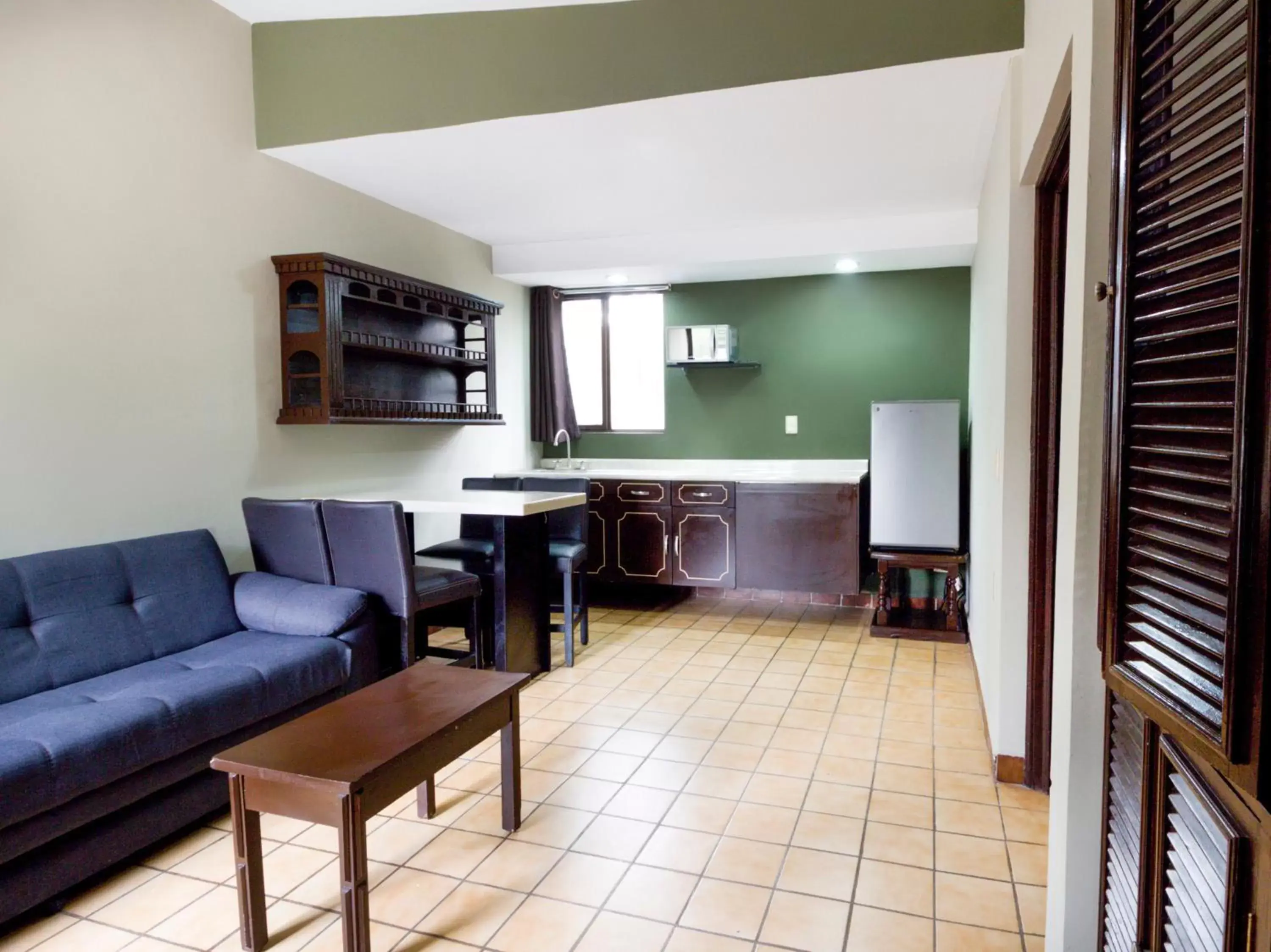 Bedroom, Kitchen/Kitchenette in Hotel La Fuente, Saltillo