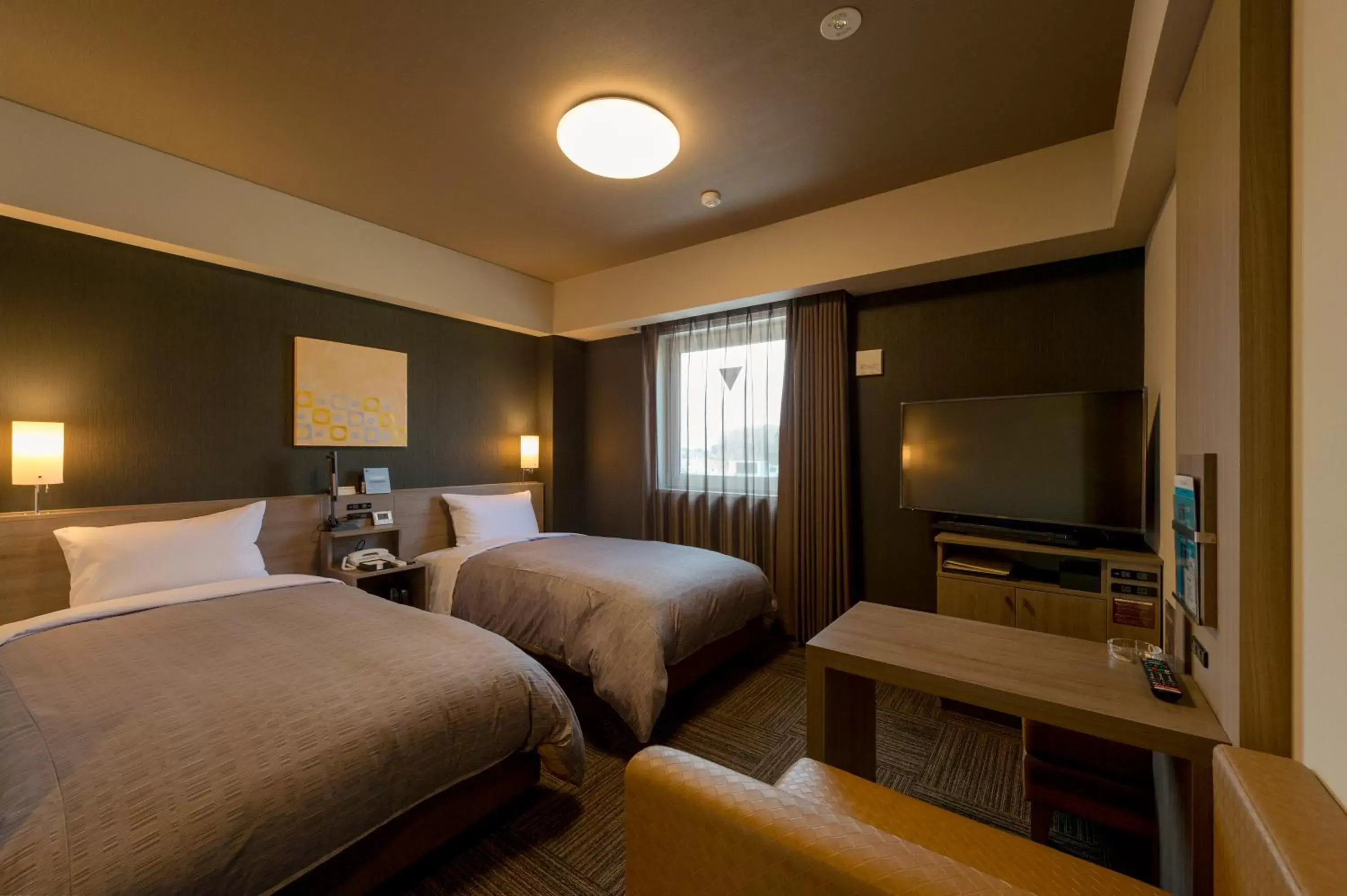 Bed in Hotel Route-inn Utsunomiya Yuinomori