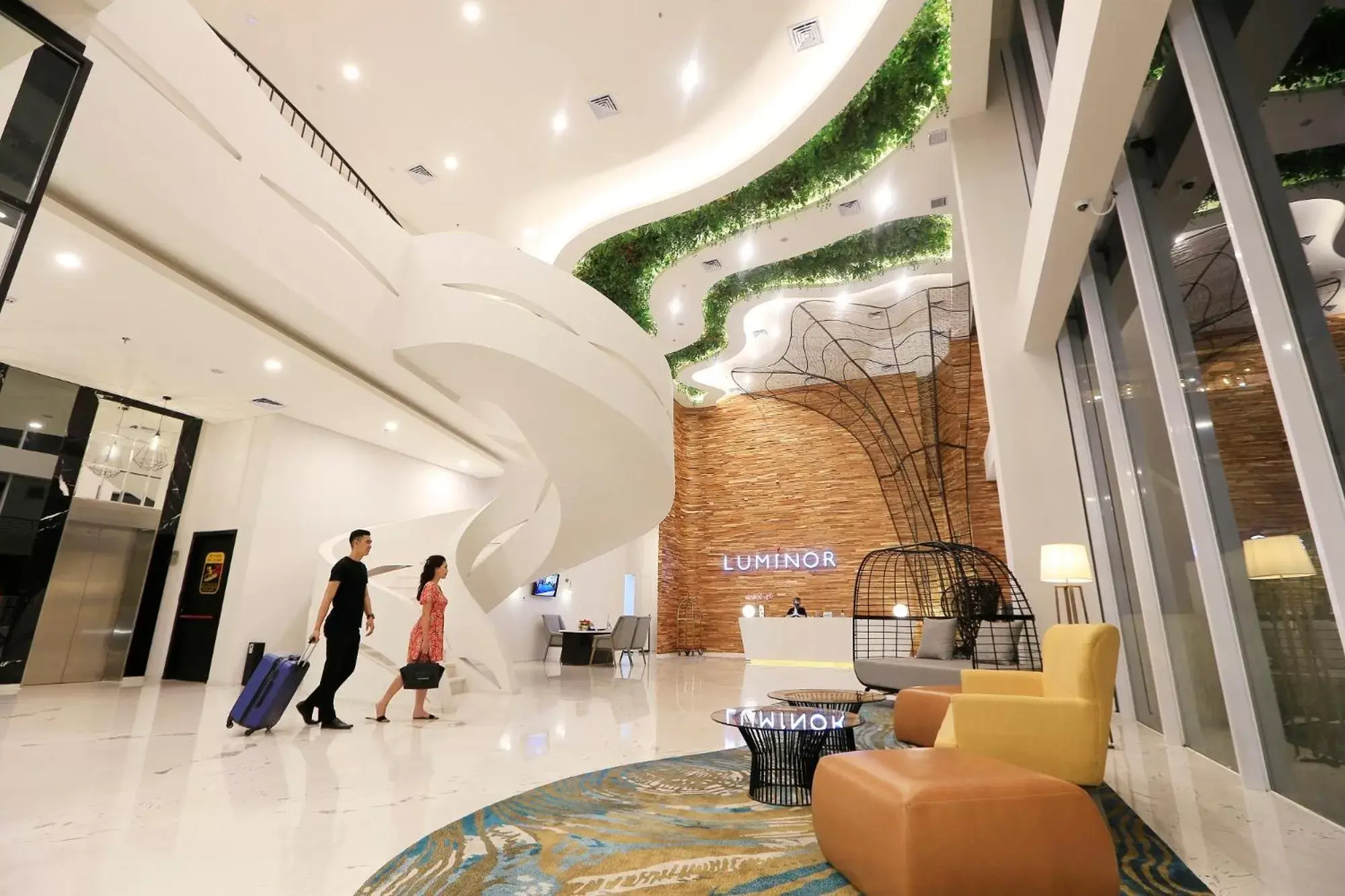 Lobby or reception in Luminor Hotel Purwokerto By WH