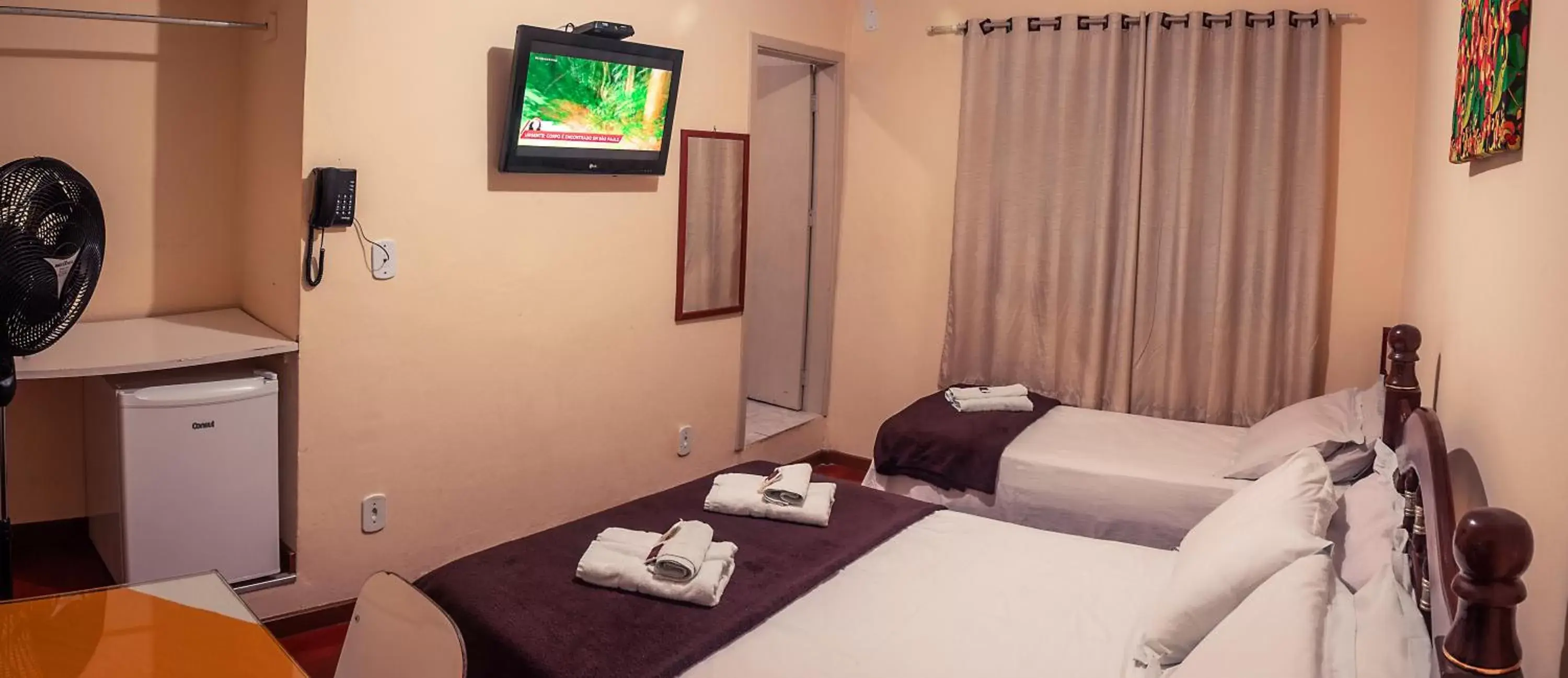 Budget Triple Room - single occupancy in Hotel Garfo de Ouro Budget Triple Room - single occupancy in Hotel Garfo de Ouro