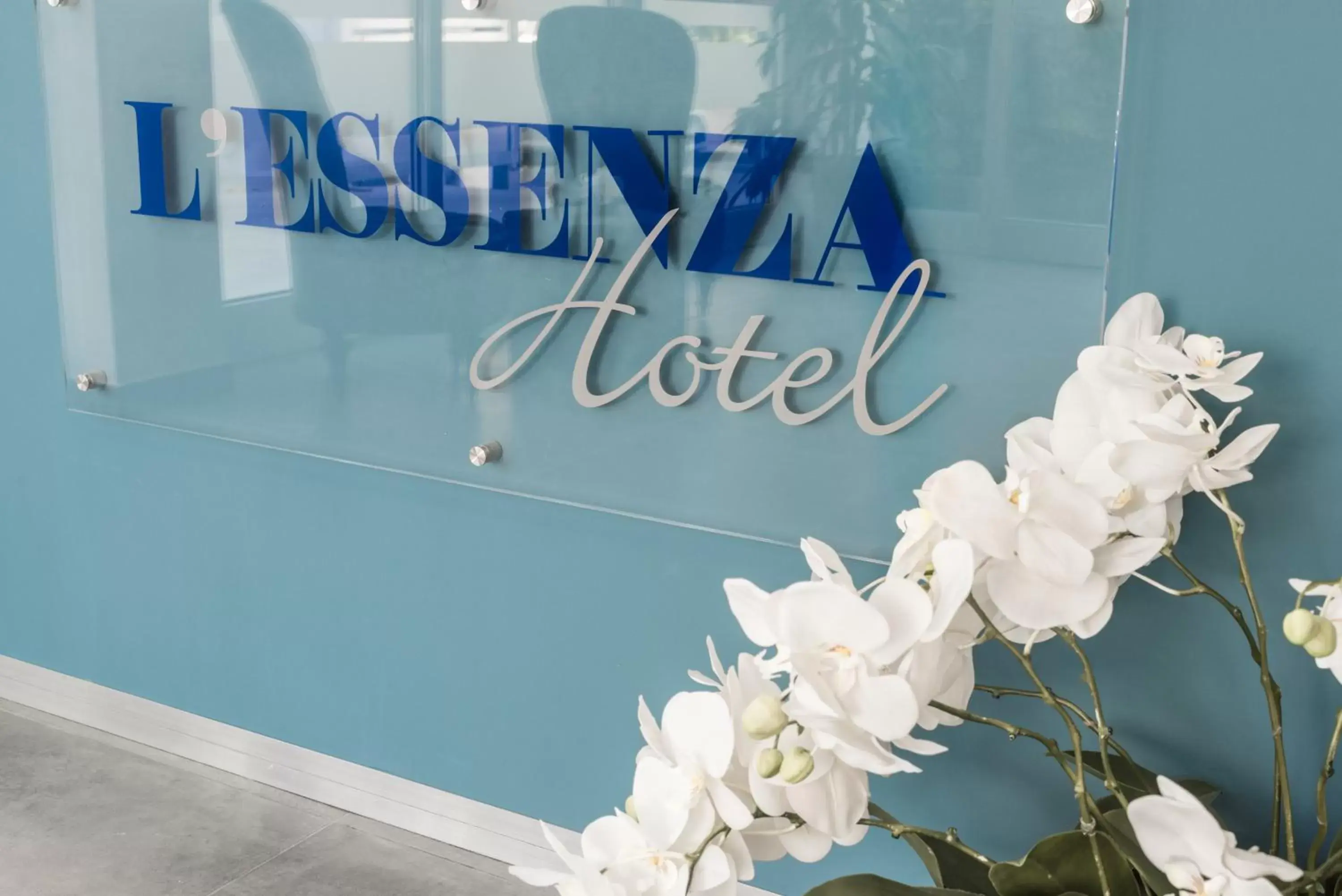 Property logo or sign in L'Essenza Hotel