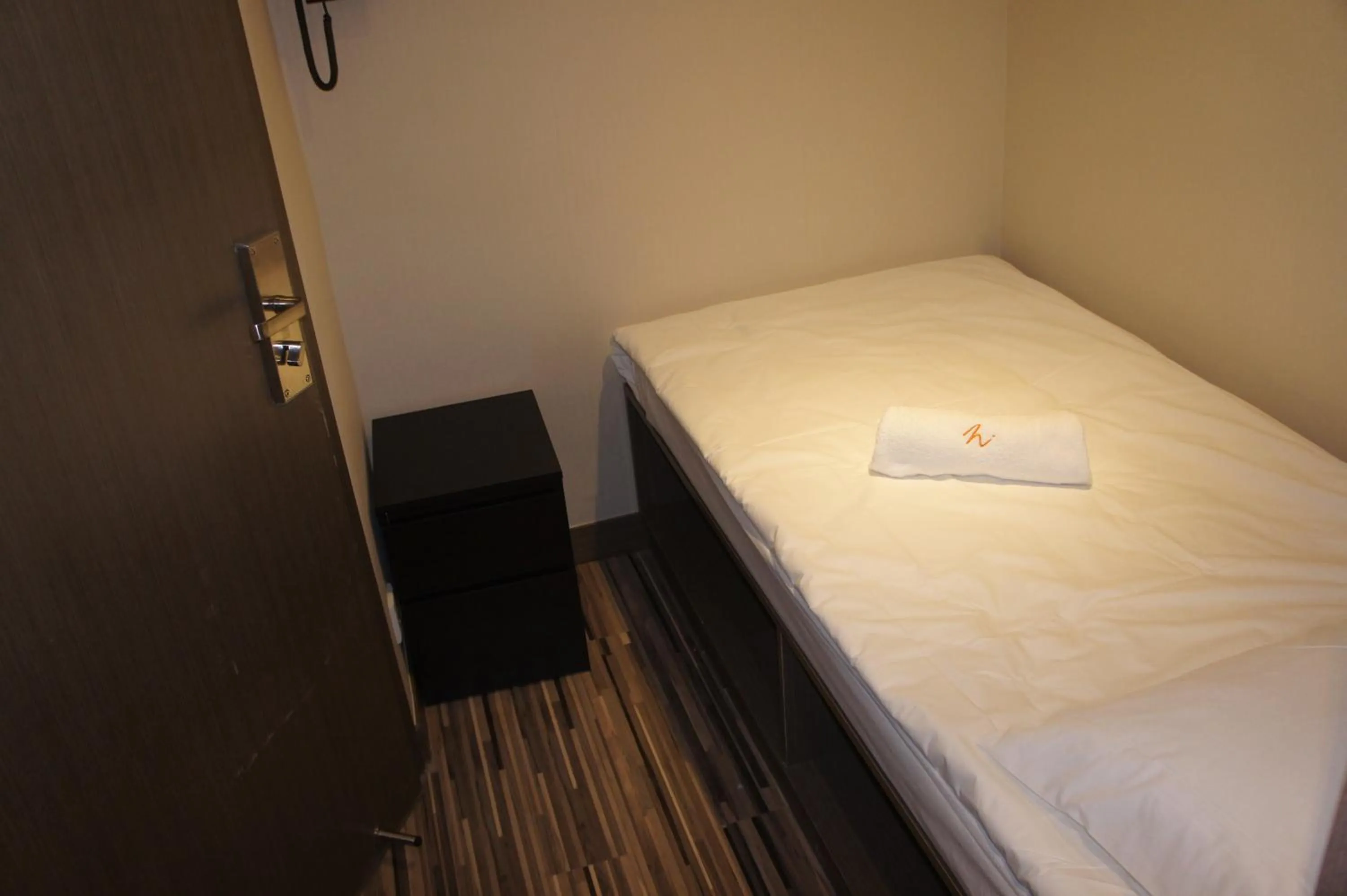 Bed in Homy Inn North Point