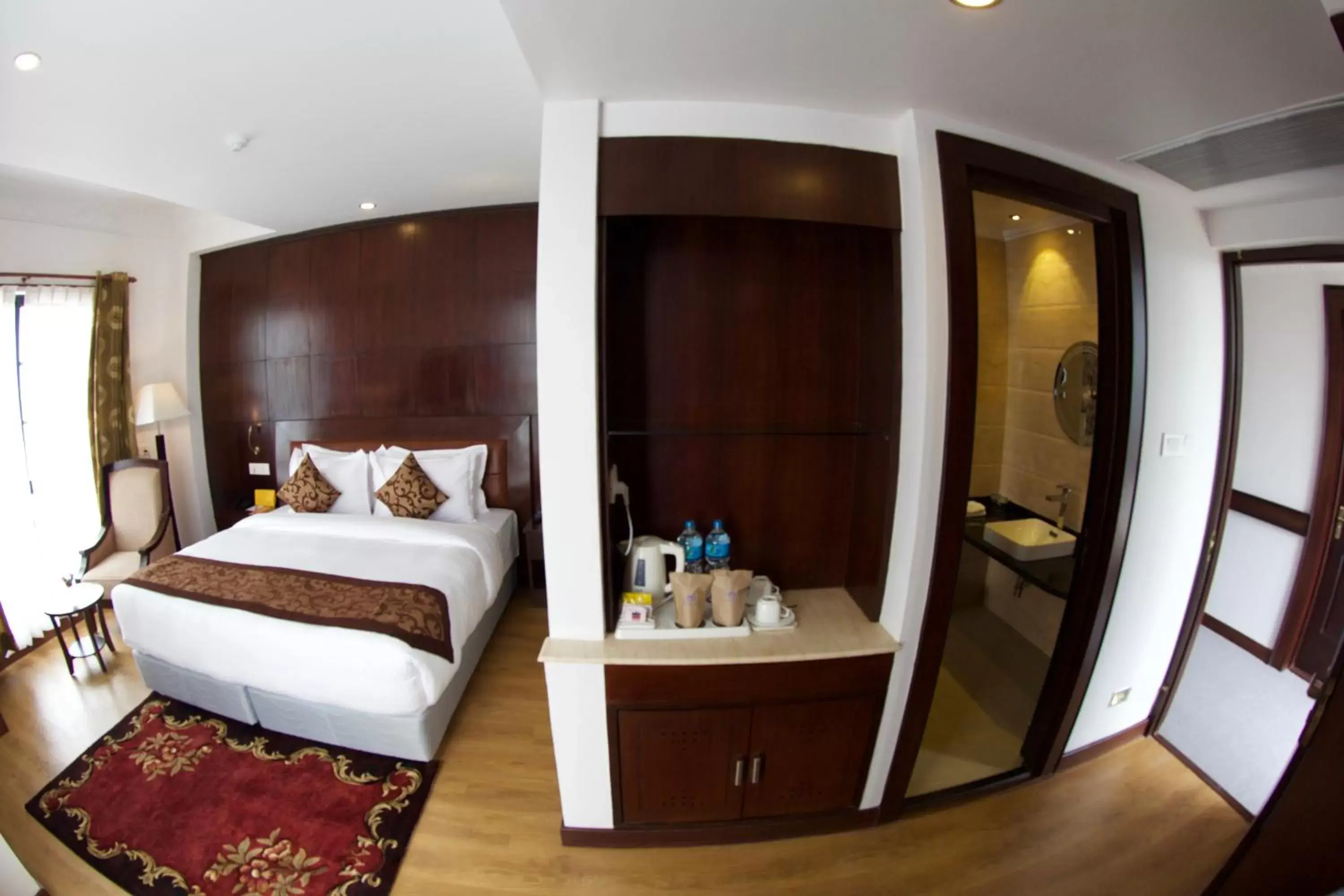 Photo of the whole room, Bed in Maya Manor Boutique Hotel by KGH Group