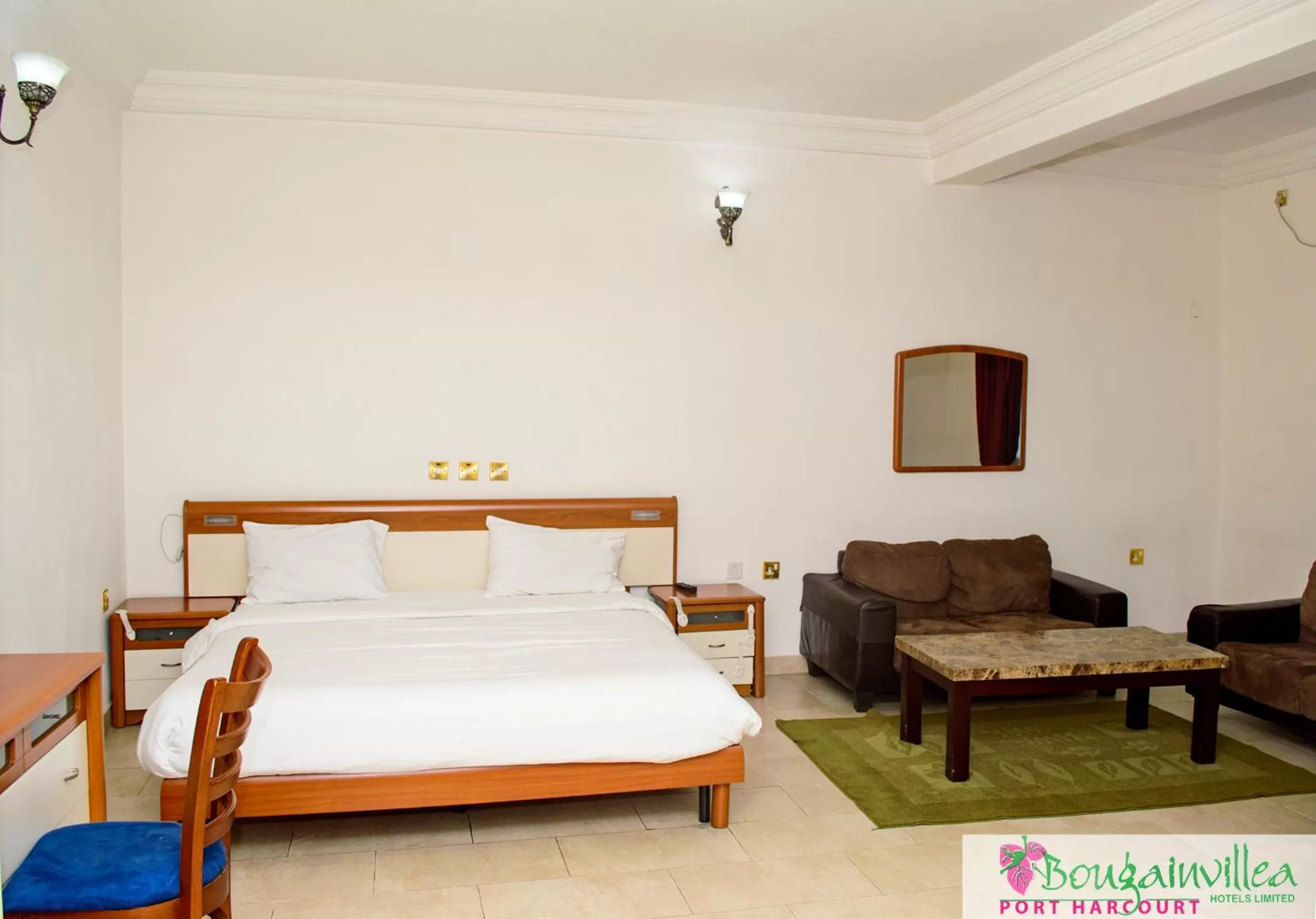 Bed in Bougainvillea Hotels