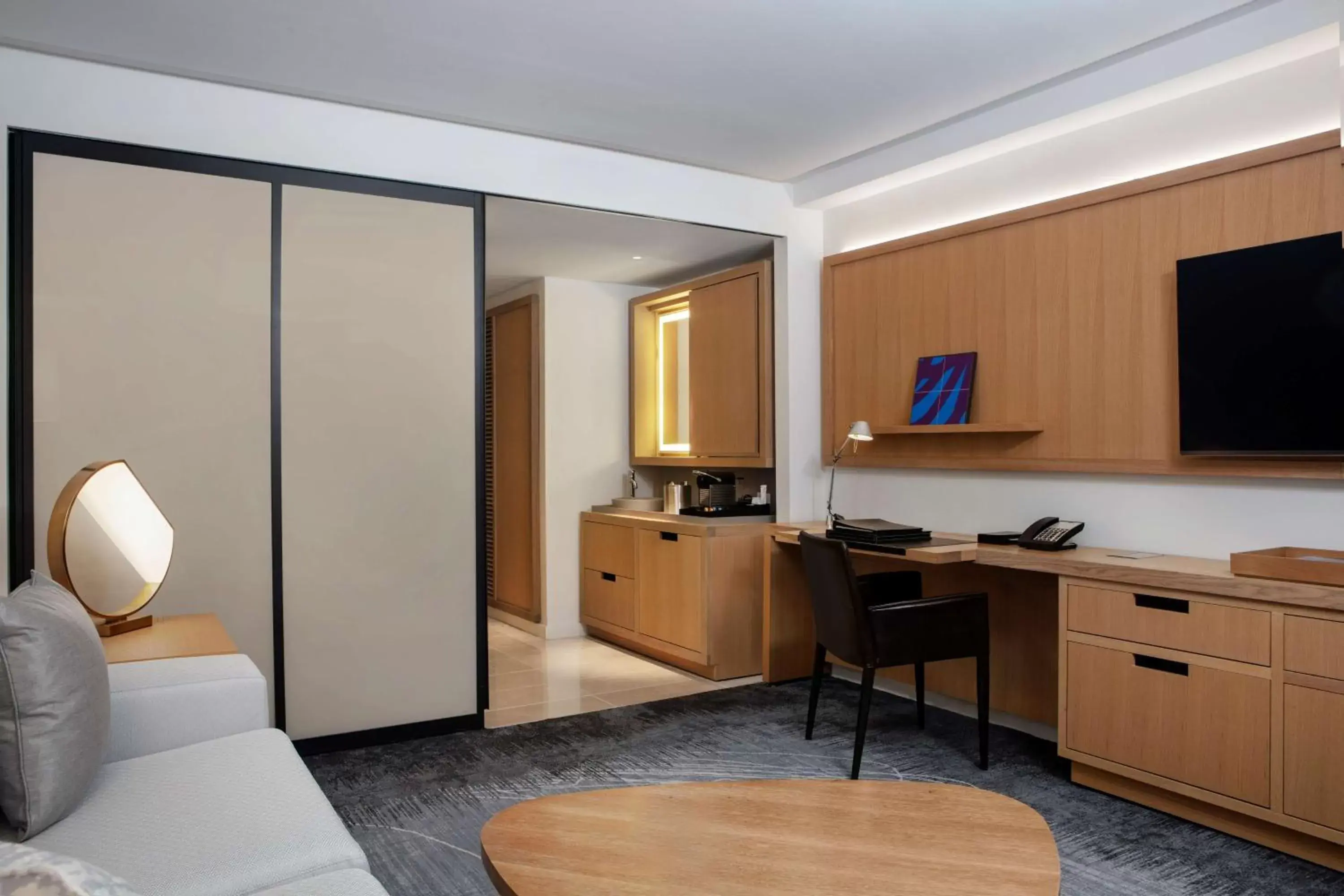 Bedroom, TV/Entertainment Center in Conrad New York Downtown