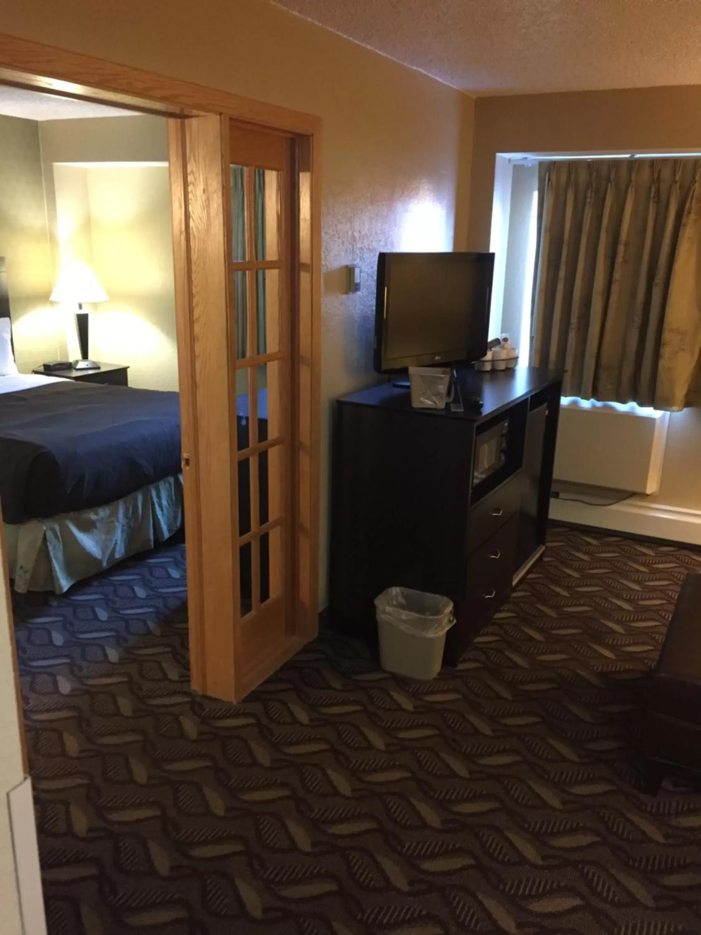 Photo of the whole room, TV/Entertainment Center in Days Inn by Wyndham Bismarck