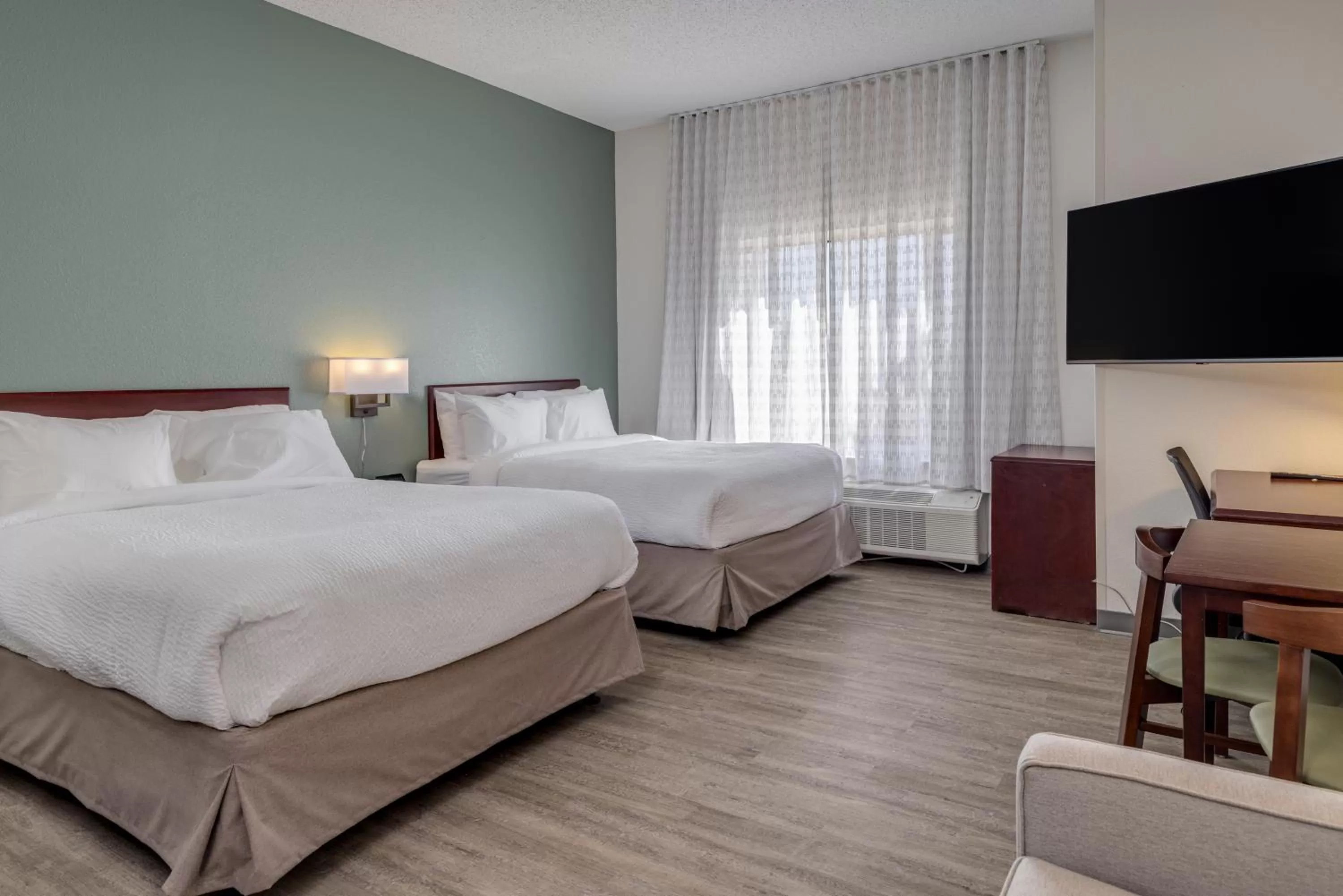 Bed in MySuites Lawton