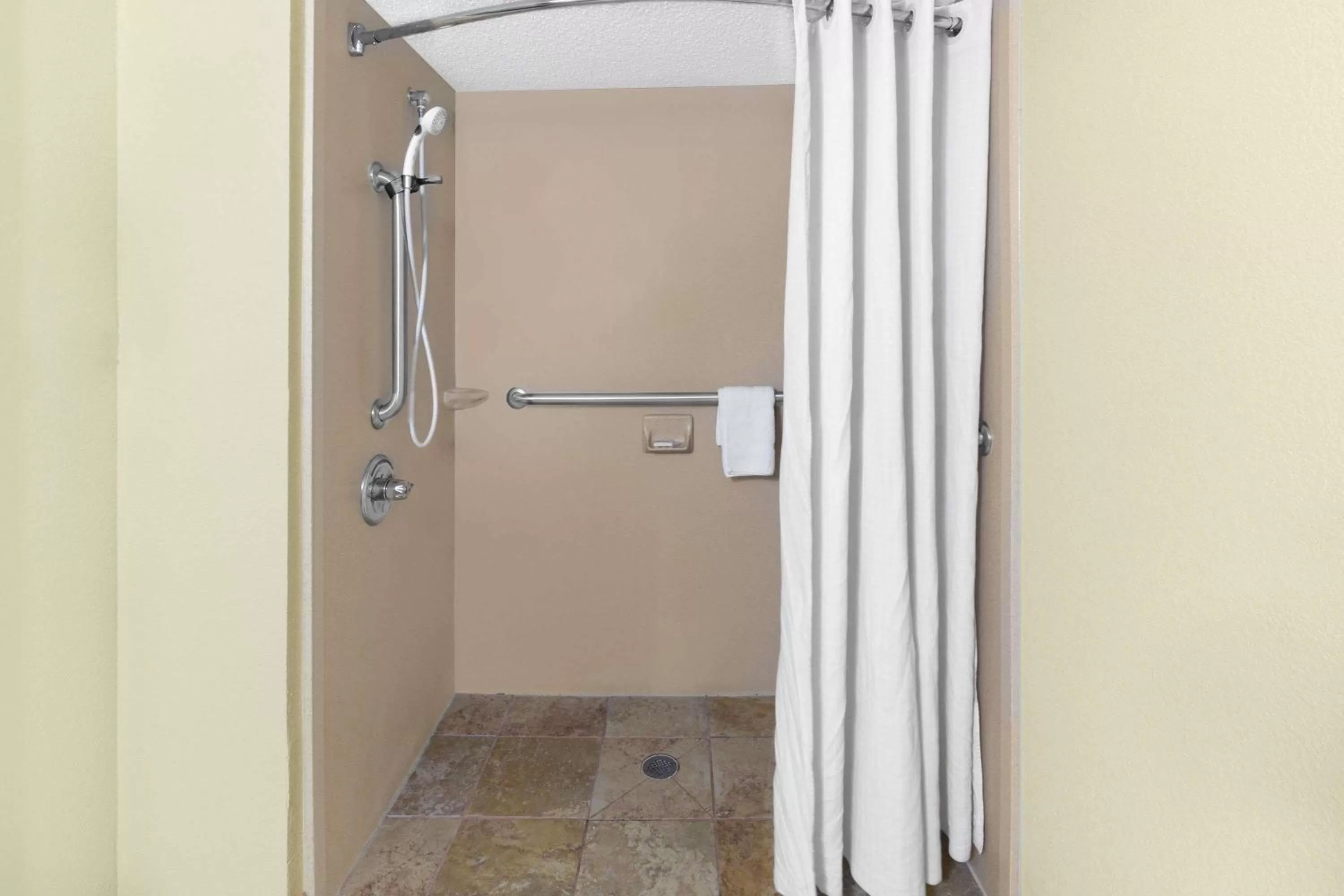 Shower in Super 8 by Wyndham Hattiesburg South