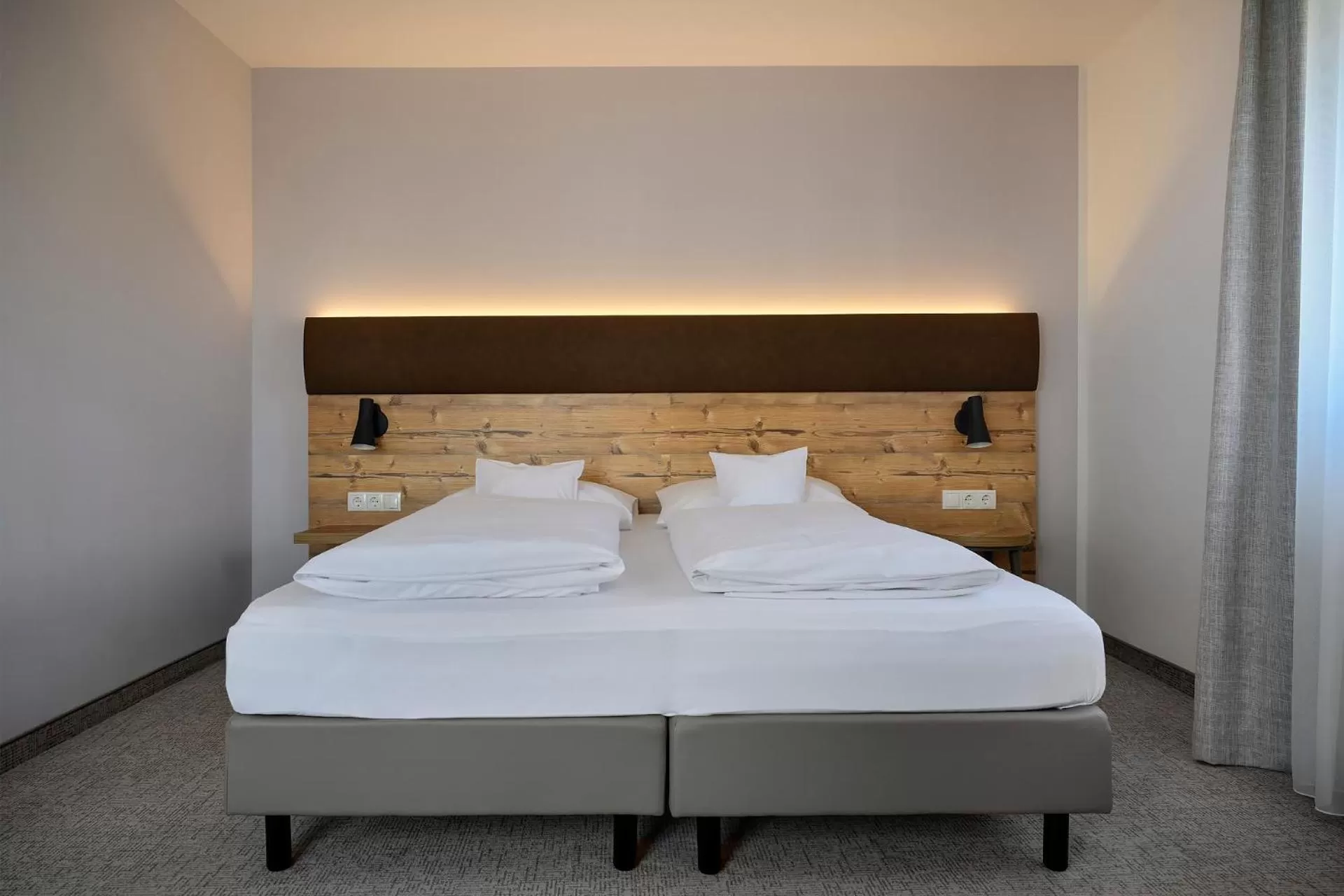 Bed in ApartHotel Rose