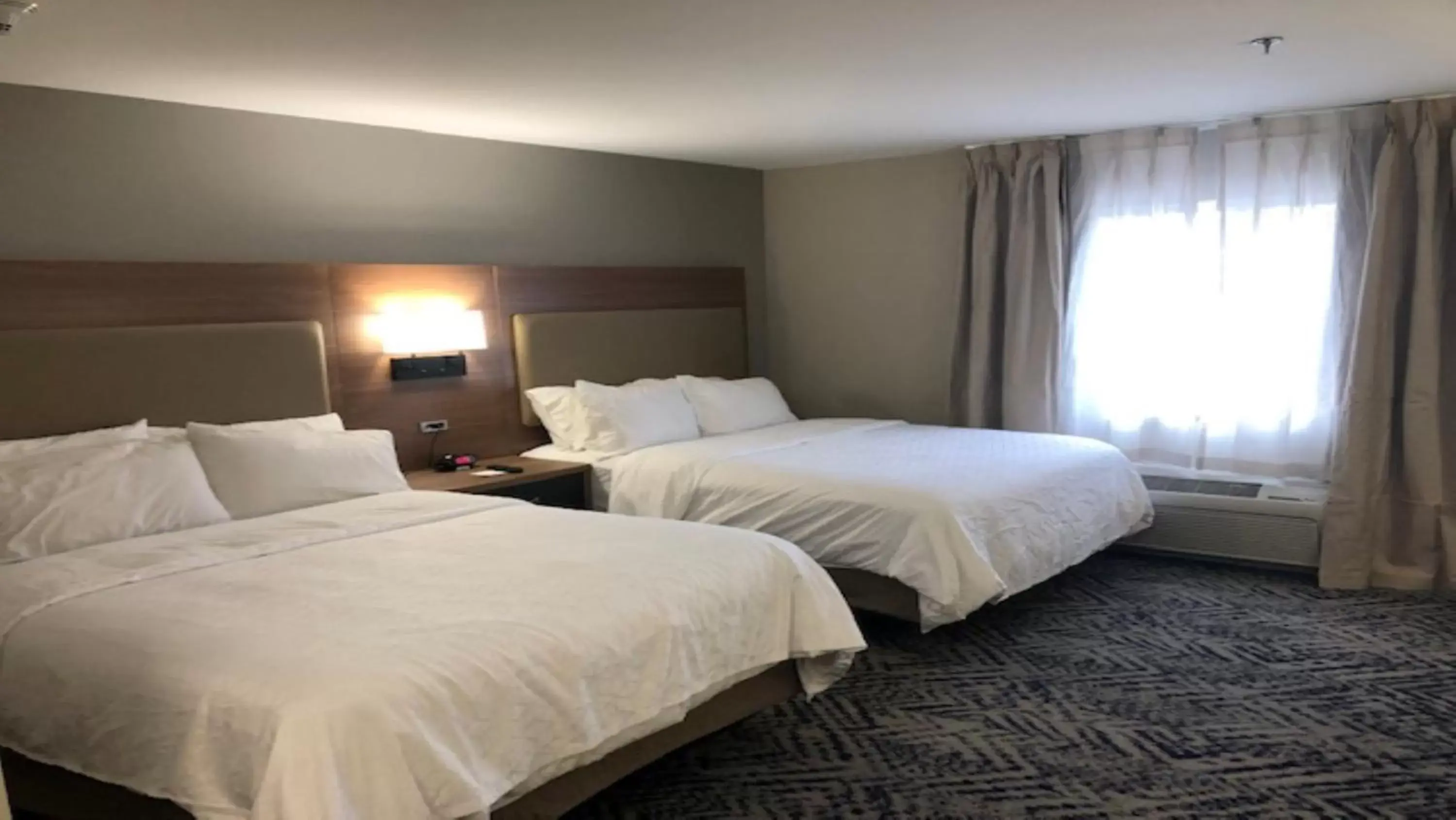 Photo of the whole room, Bed in Candlewood Suites Watertown Fort Drum, an IHG Hotel