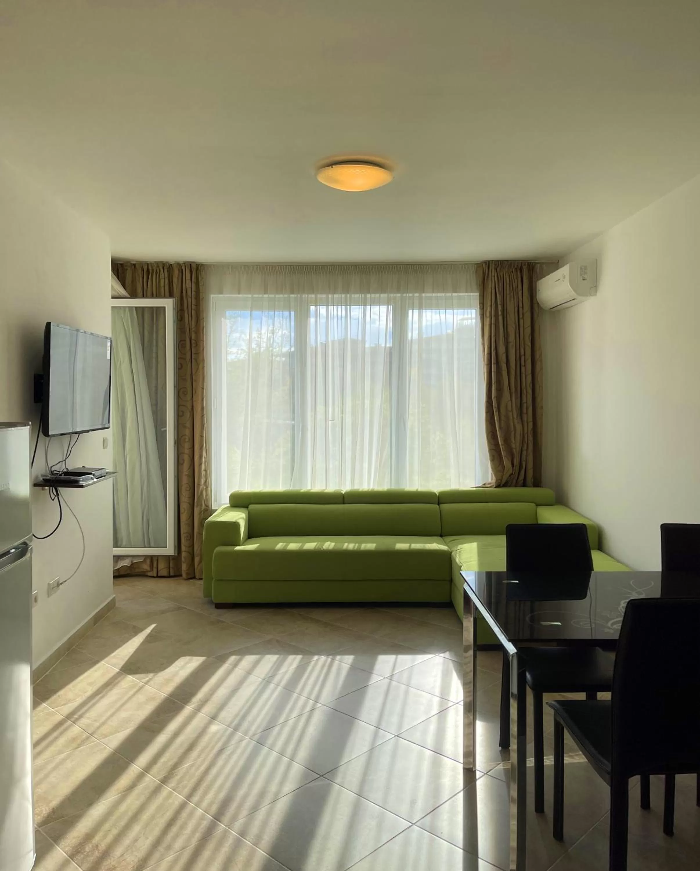 Communal lounge/ TV room in Ravda Family Resort. Park&Sea