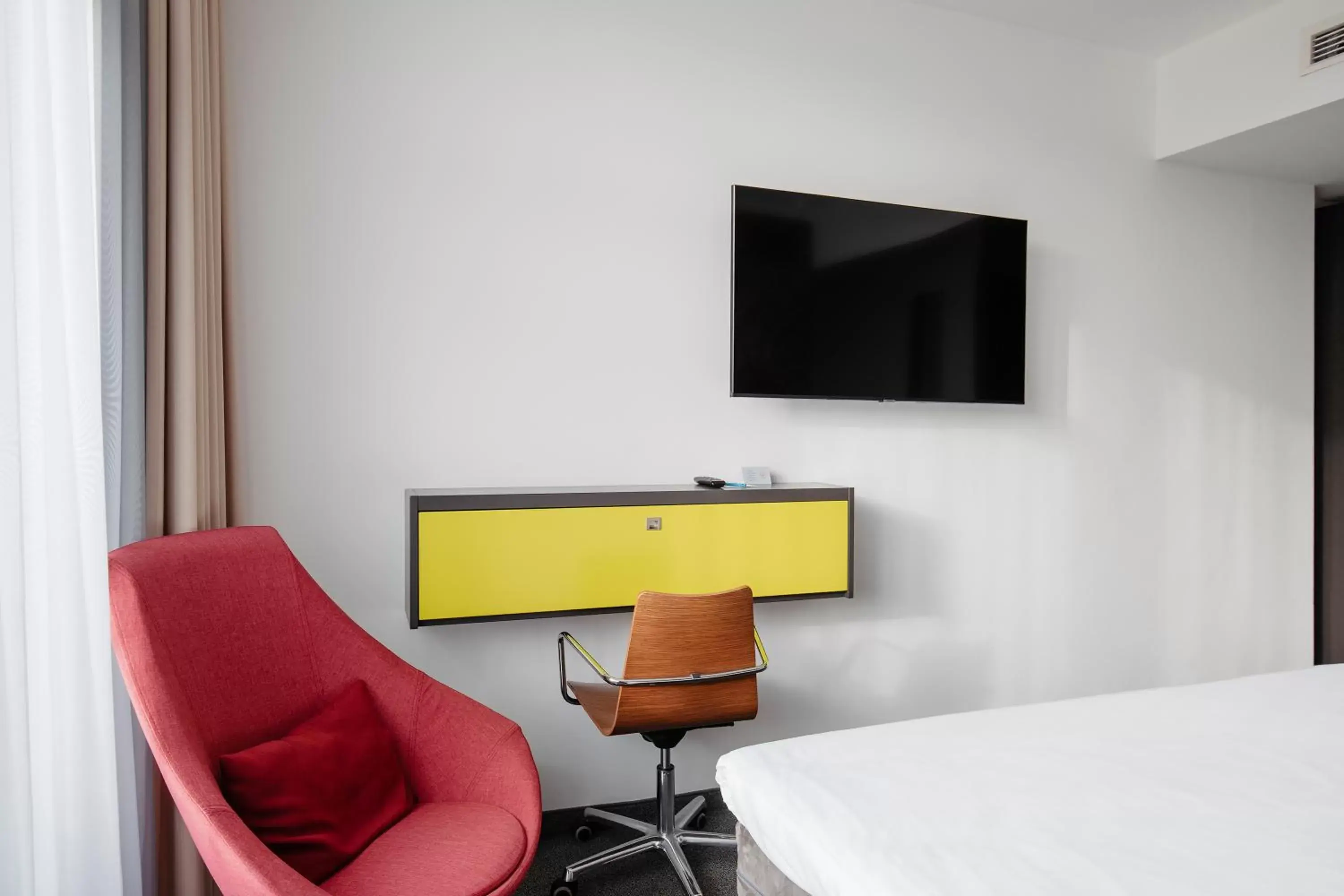 TV and multimedia, TV/Entertainment Center in Hotel Berlin, Berlin, a member of Radisson Individuals