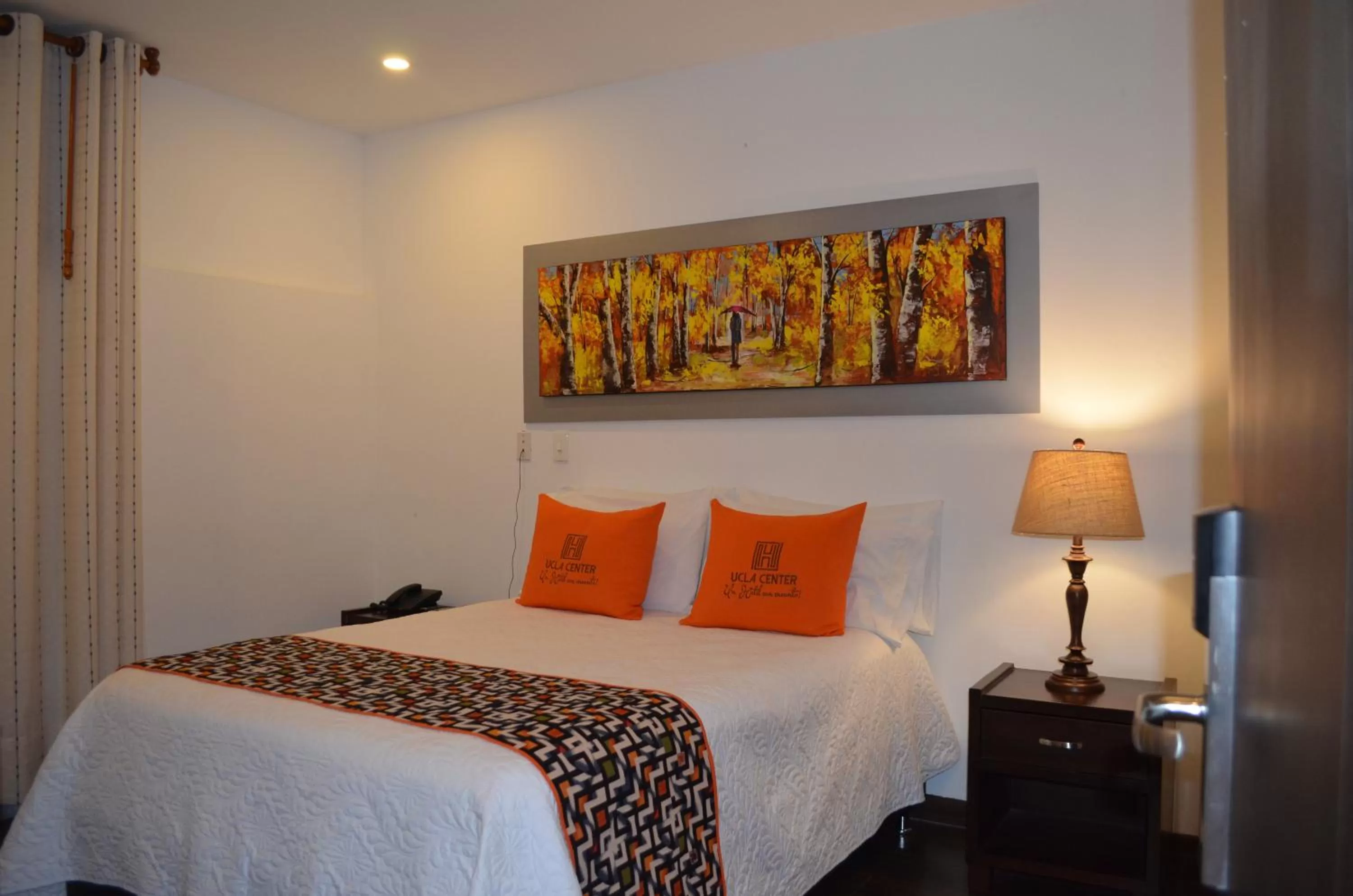 Photo of the whole room, Bed in Hotel Ucla Center