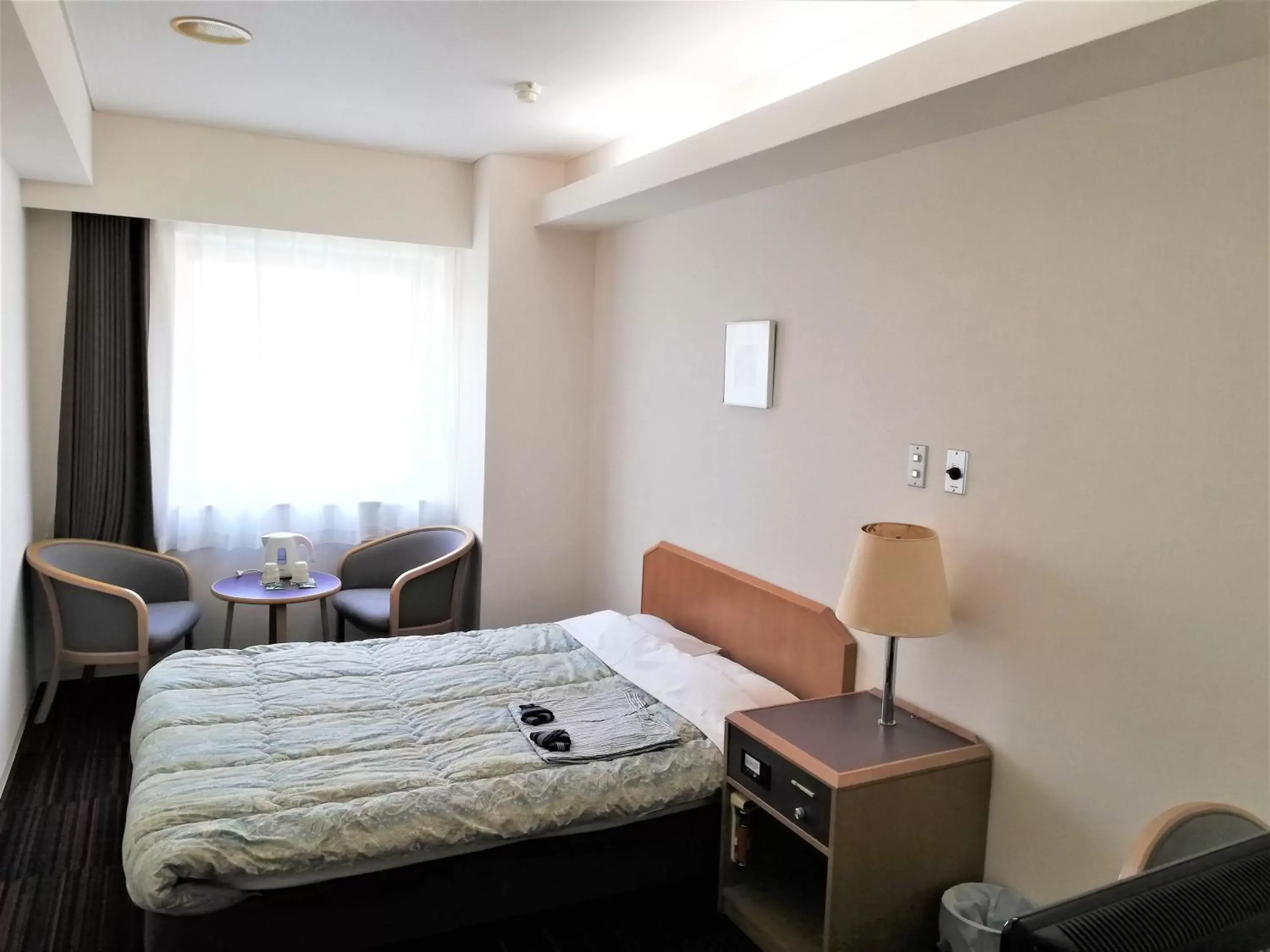 Bed in Hotel Tetora Spirit Sapporo
