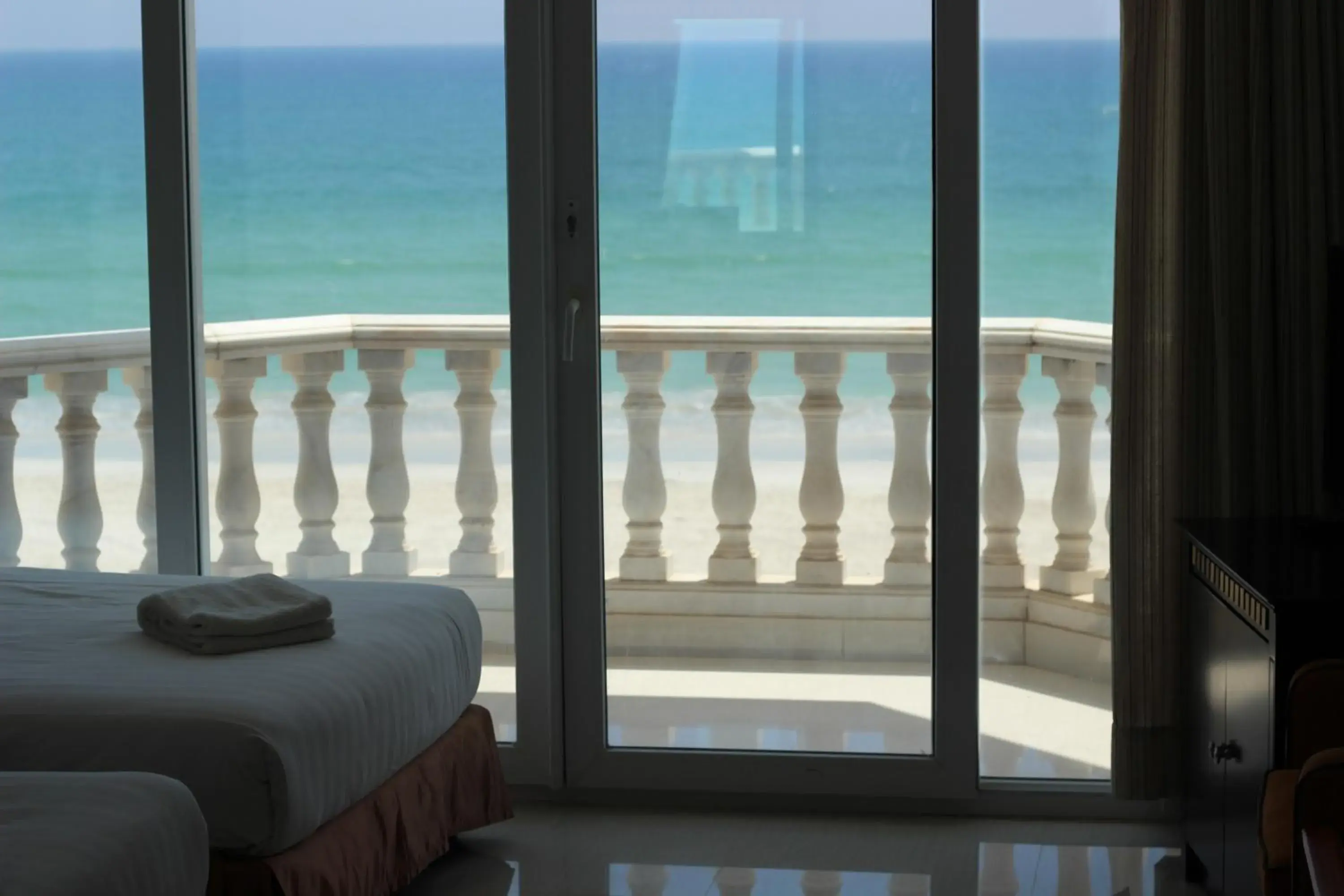 Balcony/Terrace, Bed in Beach Resort Salalah Balcony/Terrace, Bed in Beach Resort Salalah
