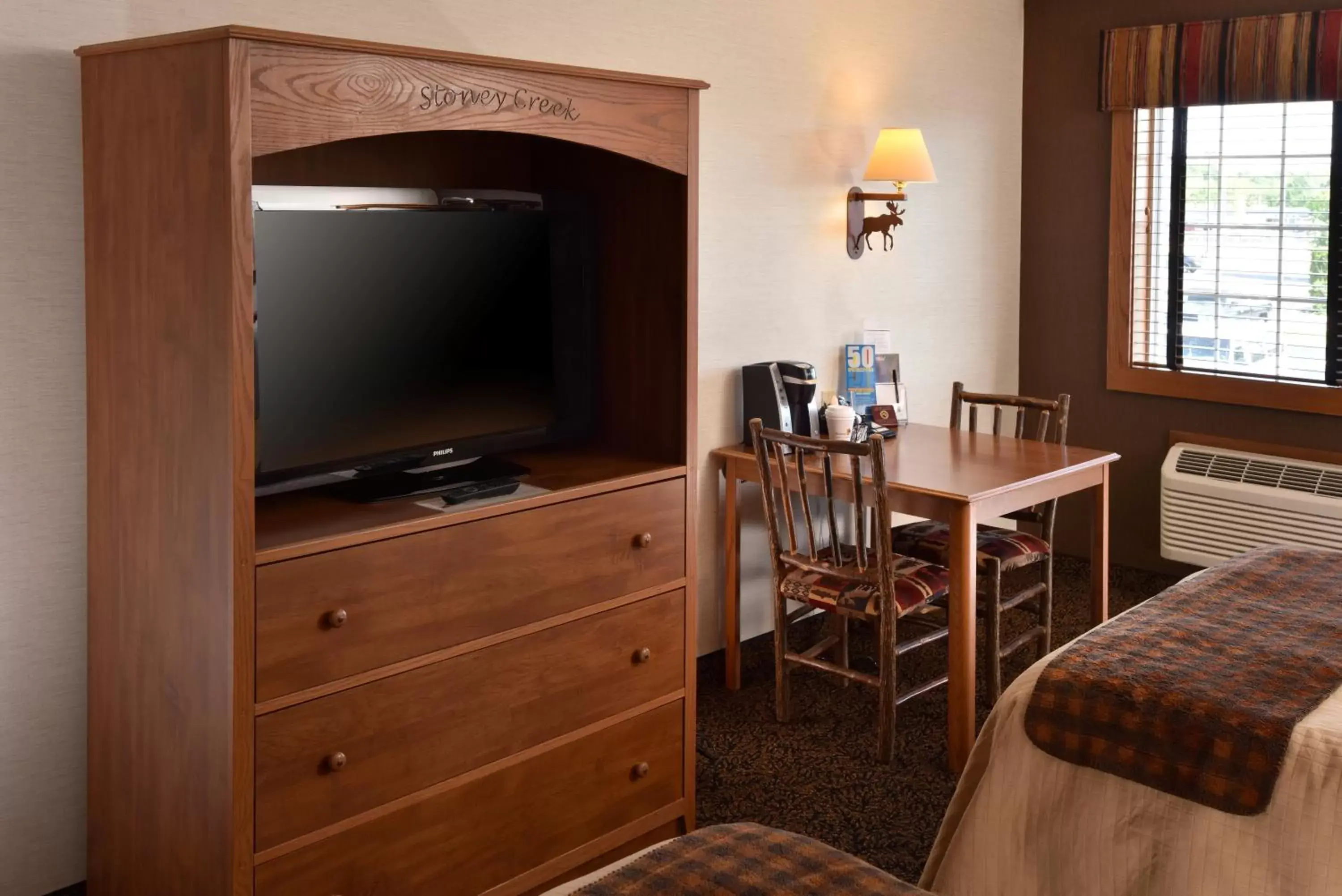 Decorative detail, TV/Entertainment Center in Stoney Creek Inn Quincy