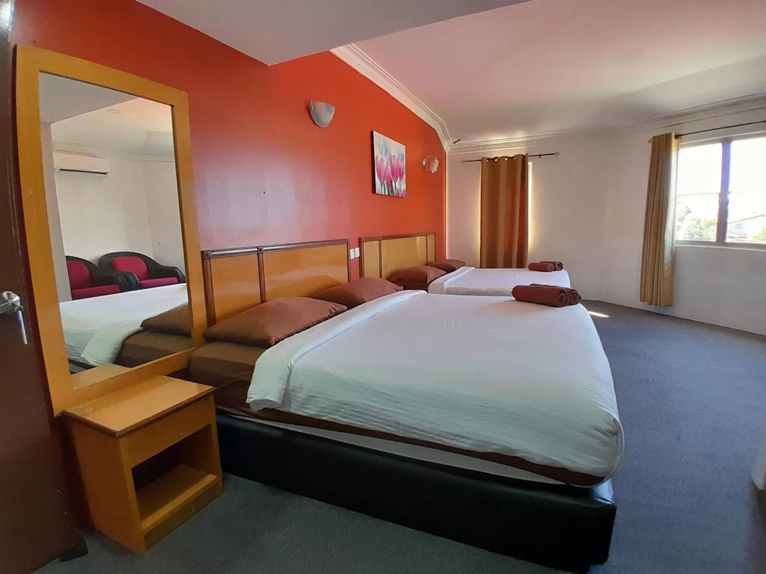 Bed in THE ZULEY HERITAGE HOTEL