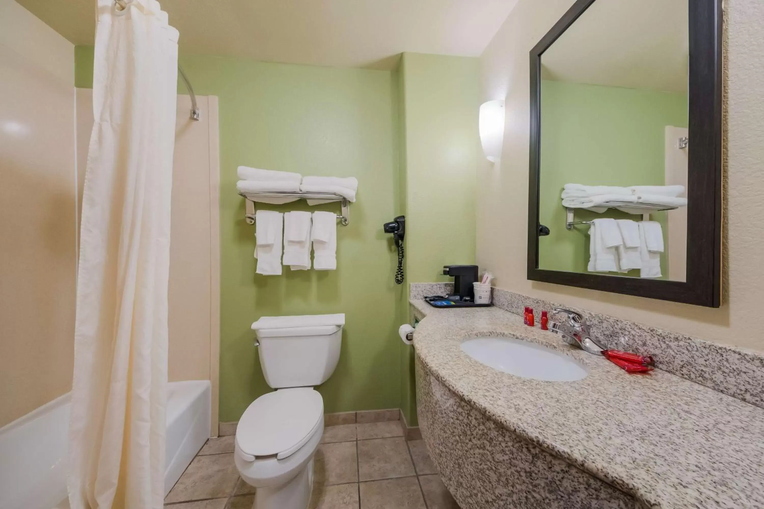 Bathroom in SureStay Plus Hotel by Best Western Near SeaWorld San Antonio