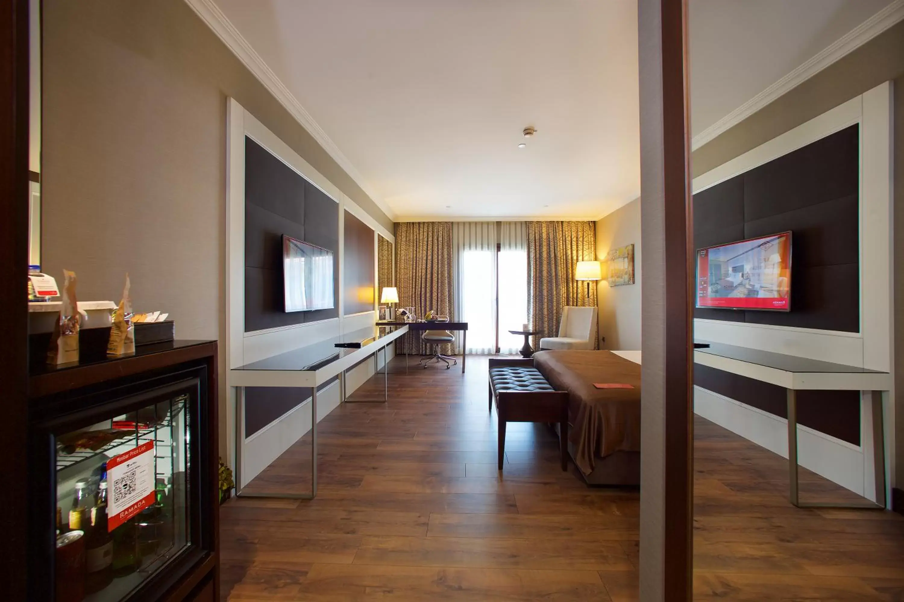 Communal lounge/ TV room, TV/Entertainment Center in Ramada Hotel & Suites by Wyndham Istanbul Merter